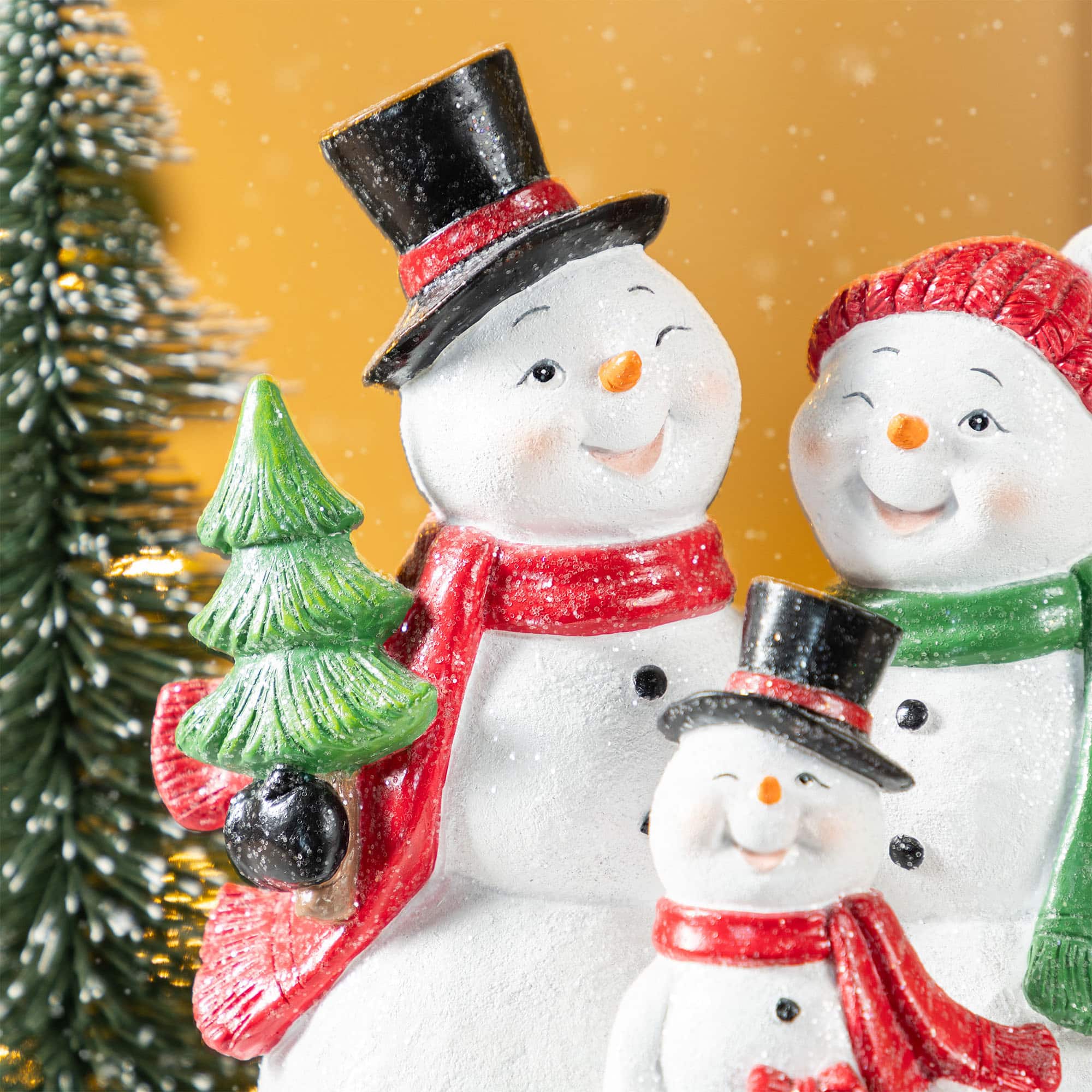 Glitzhome® 10.25" Christmas Resin Snowman Family Table Decor