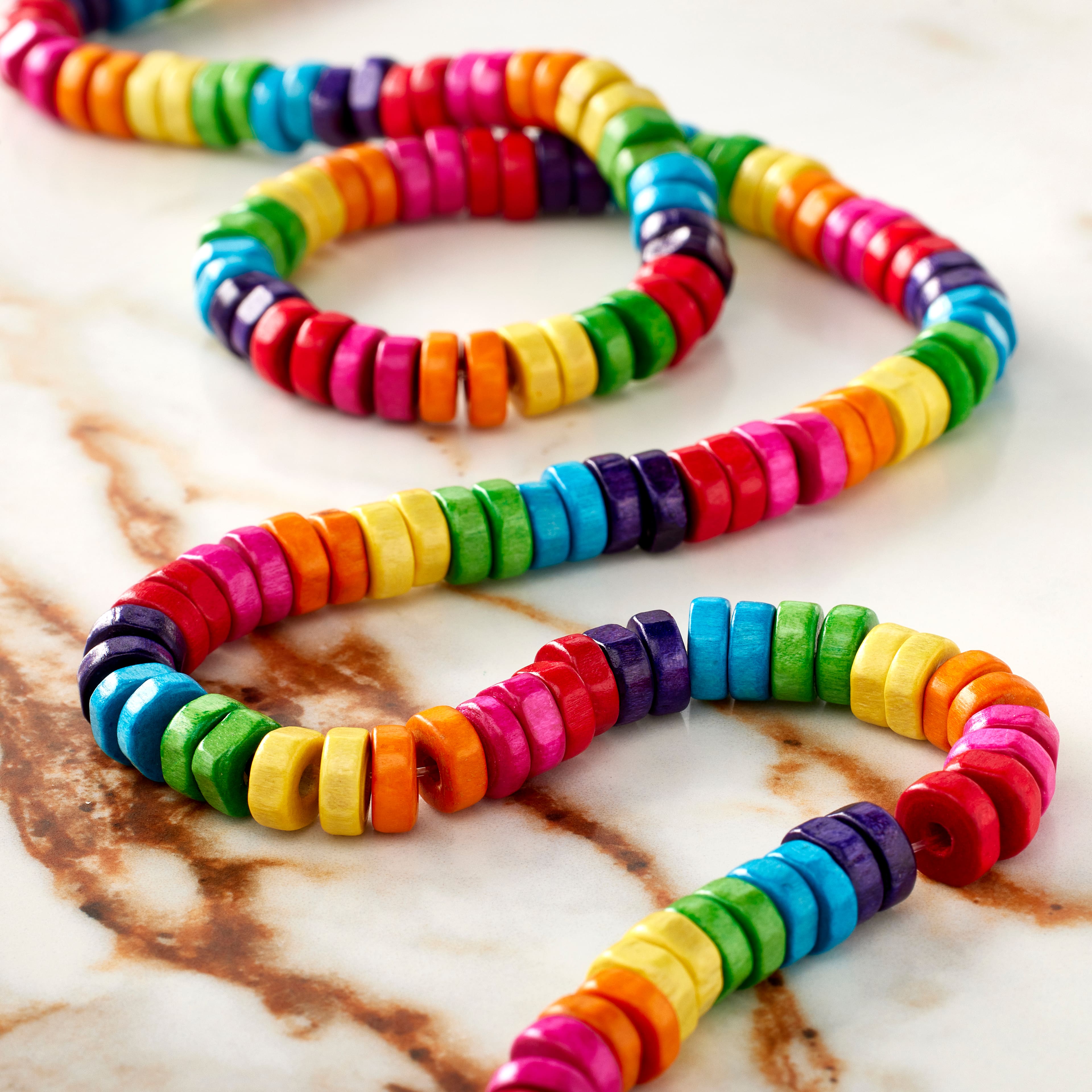 12 Pack: Multicolored Wood Heishi Beads by Bead Landing™