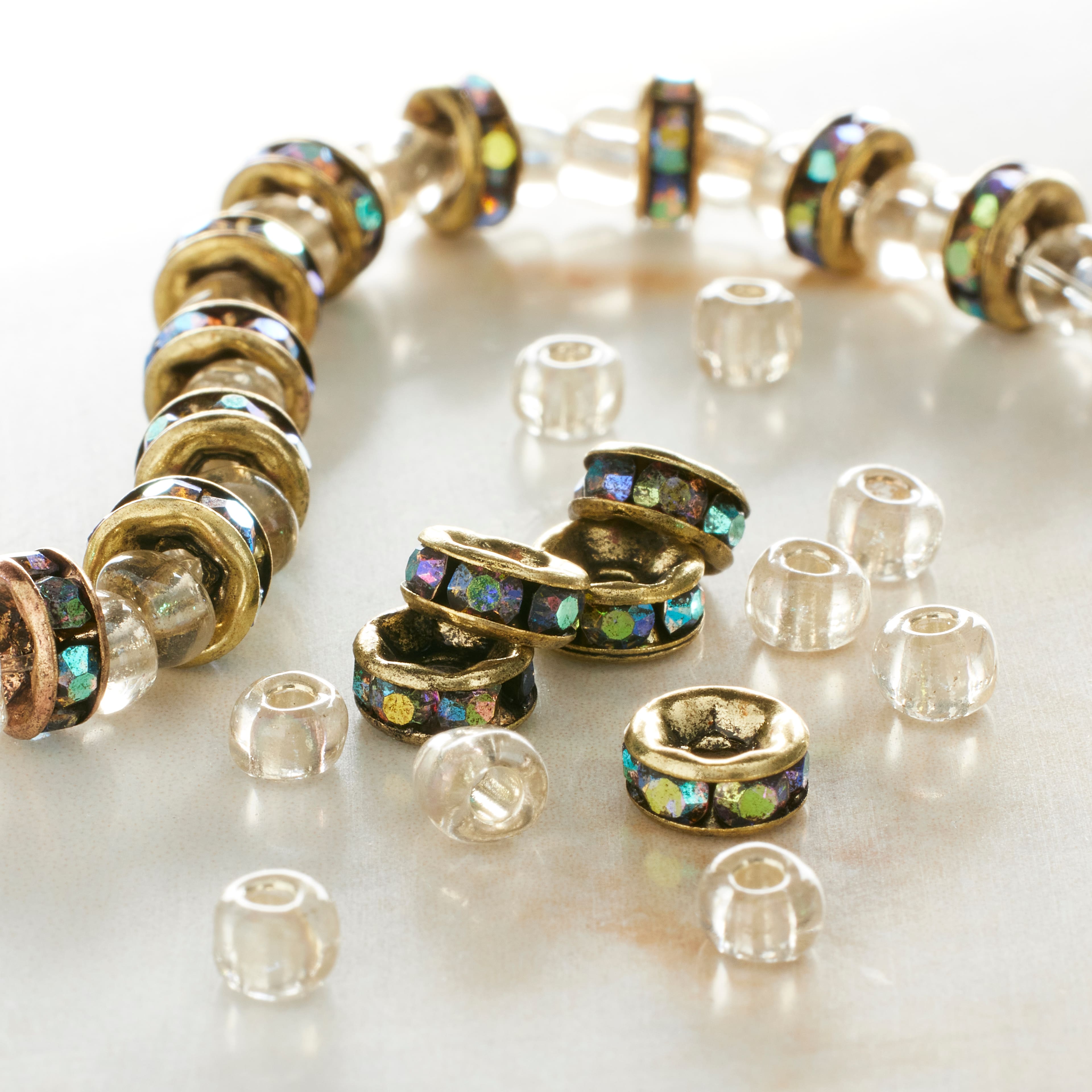 12 Pack: Metal Rhinestone Aurora Borealis Rondelle Beads, 6mm by Bead Landing&#x2122;