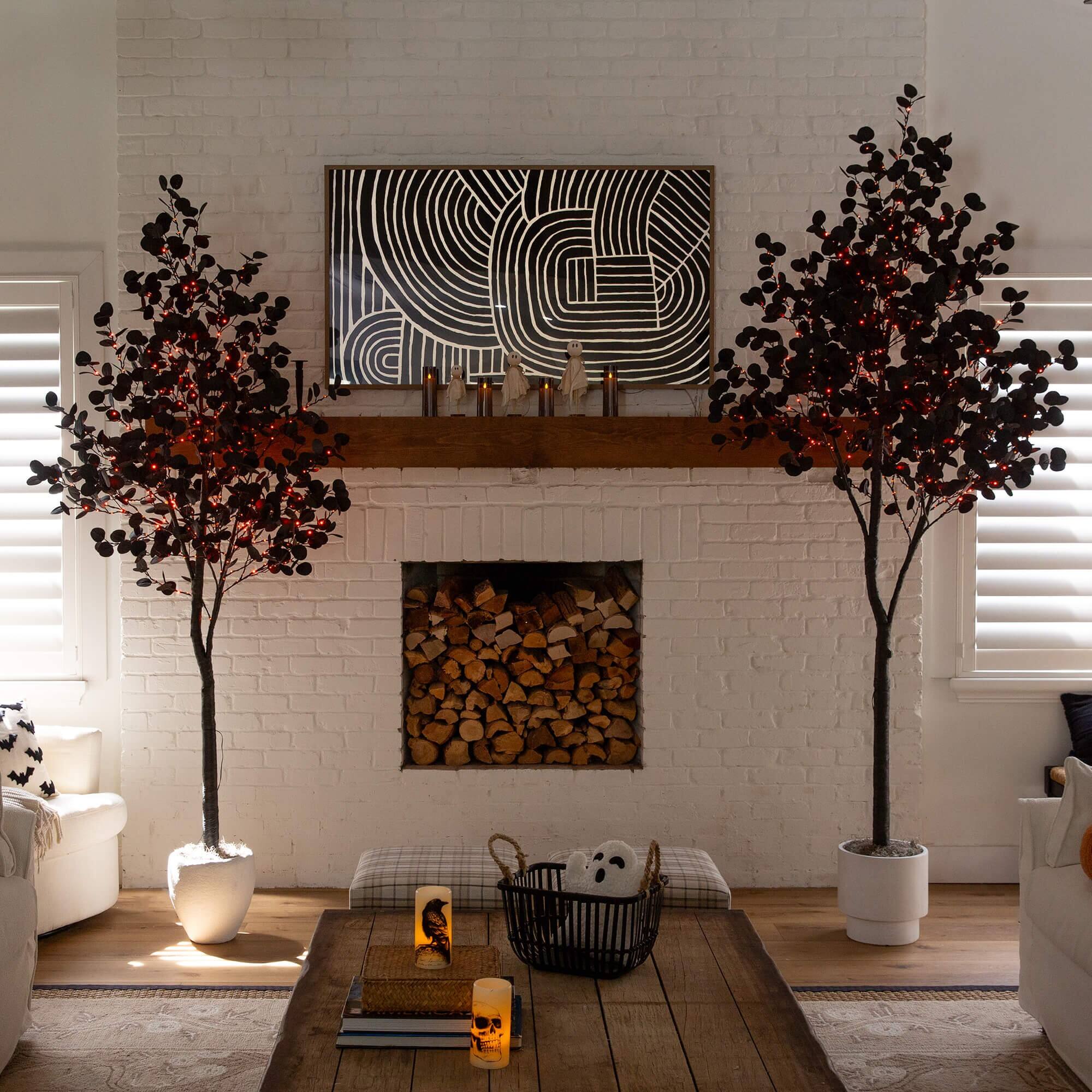 8ft. Pre-Lit Artificial Halloween Black Eucalyptus Tree with 540 Orange & Purple LED Lights