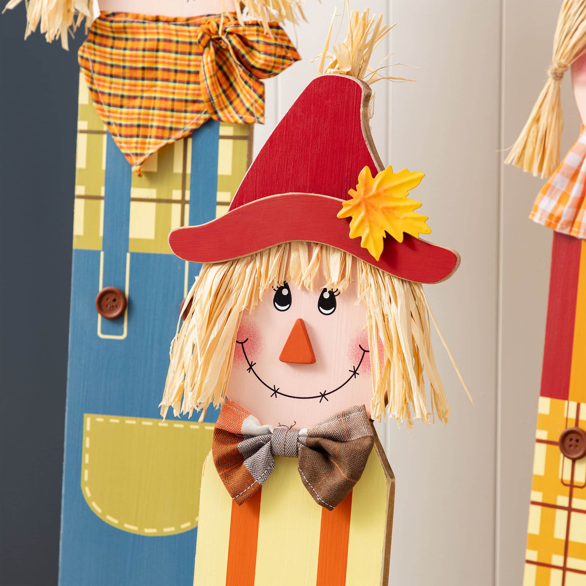 Glitzhome&#xAE; Fall Wood Sacrecrow Family Porch Decor Set