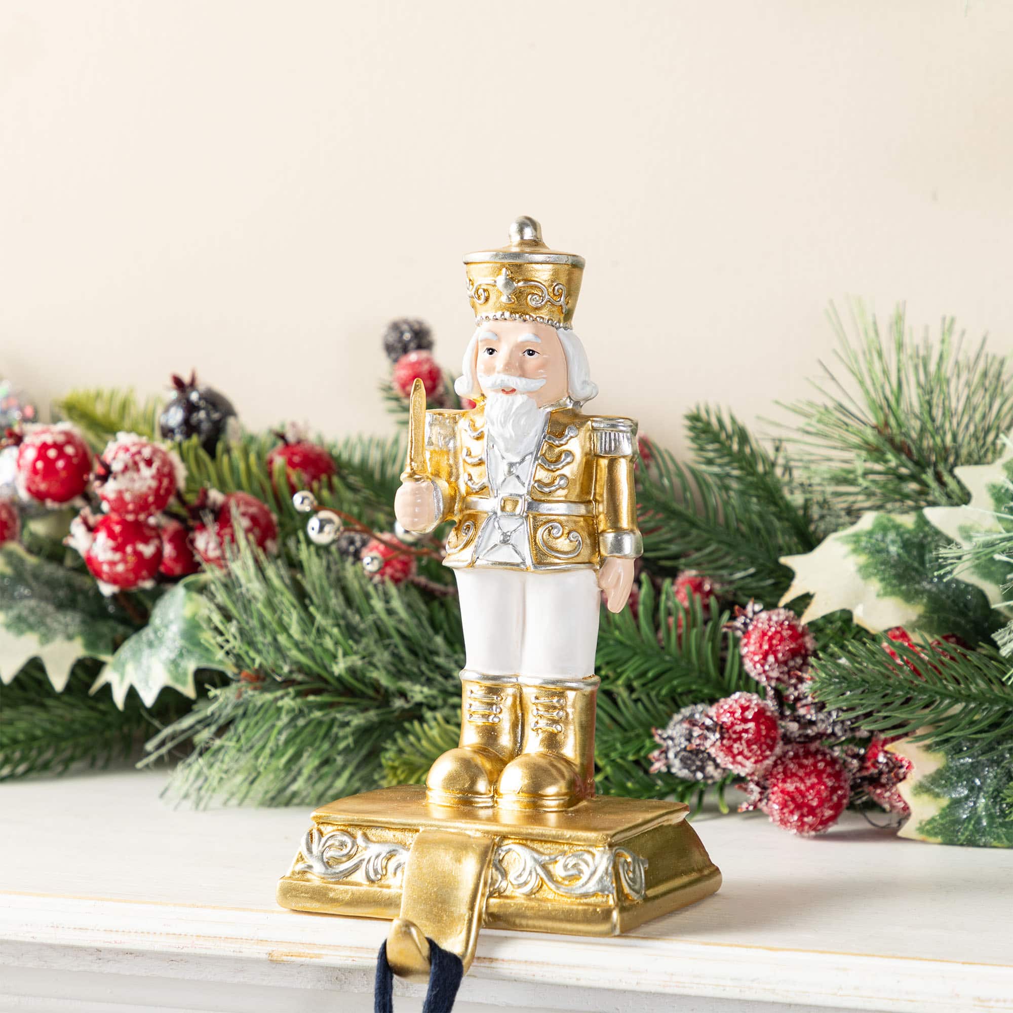 Glitzhome&#xAE; Christmas Resin Nutcracker Stocking Holder Set