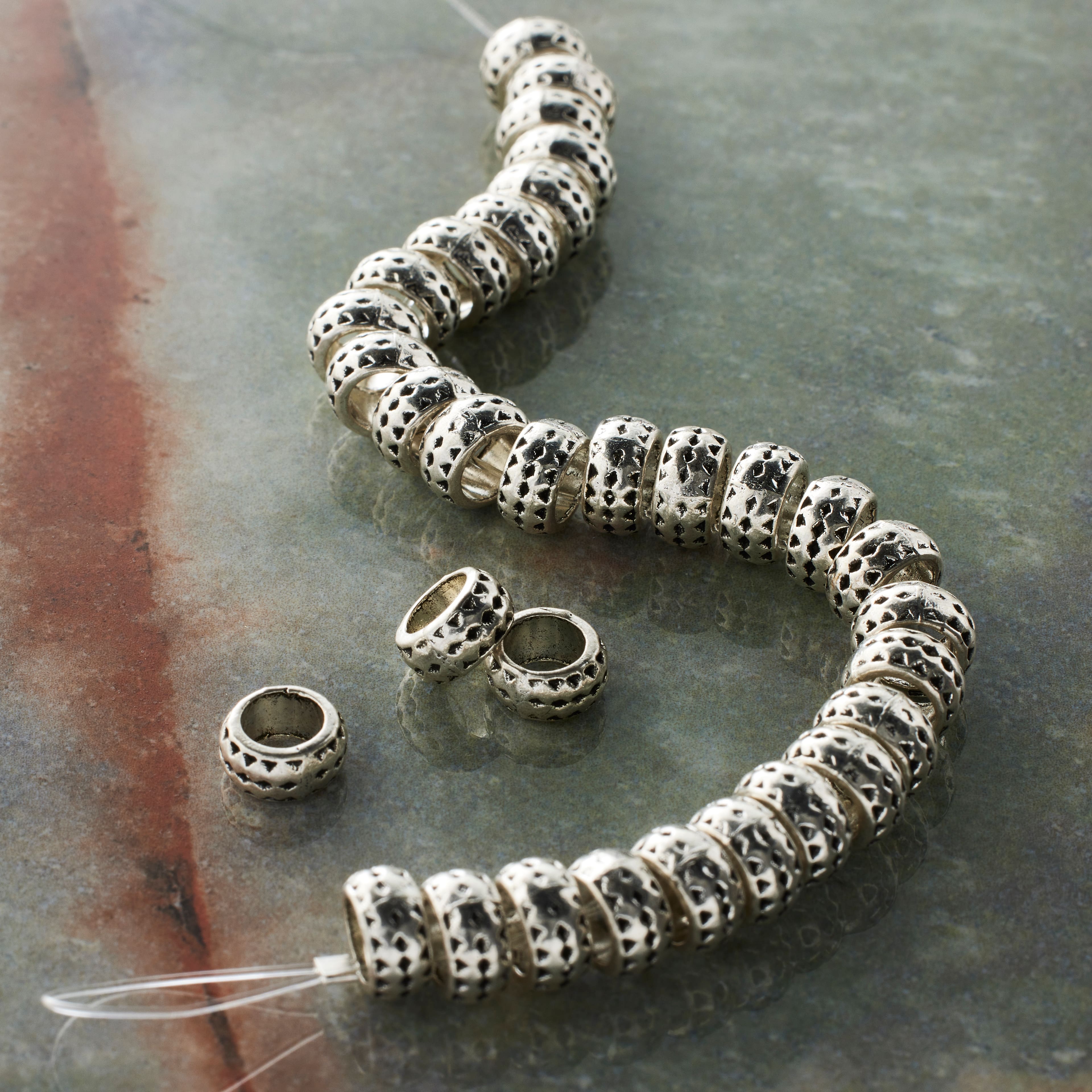 12 Packs: 33 ct. (396 total) Antique Silver Large Hole Metal Rondelle Beads, 7mm by Bead Landing™