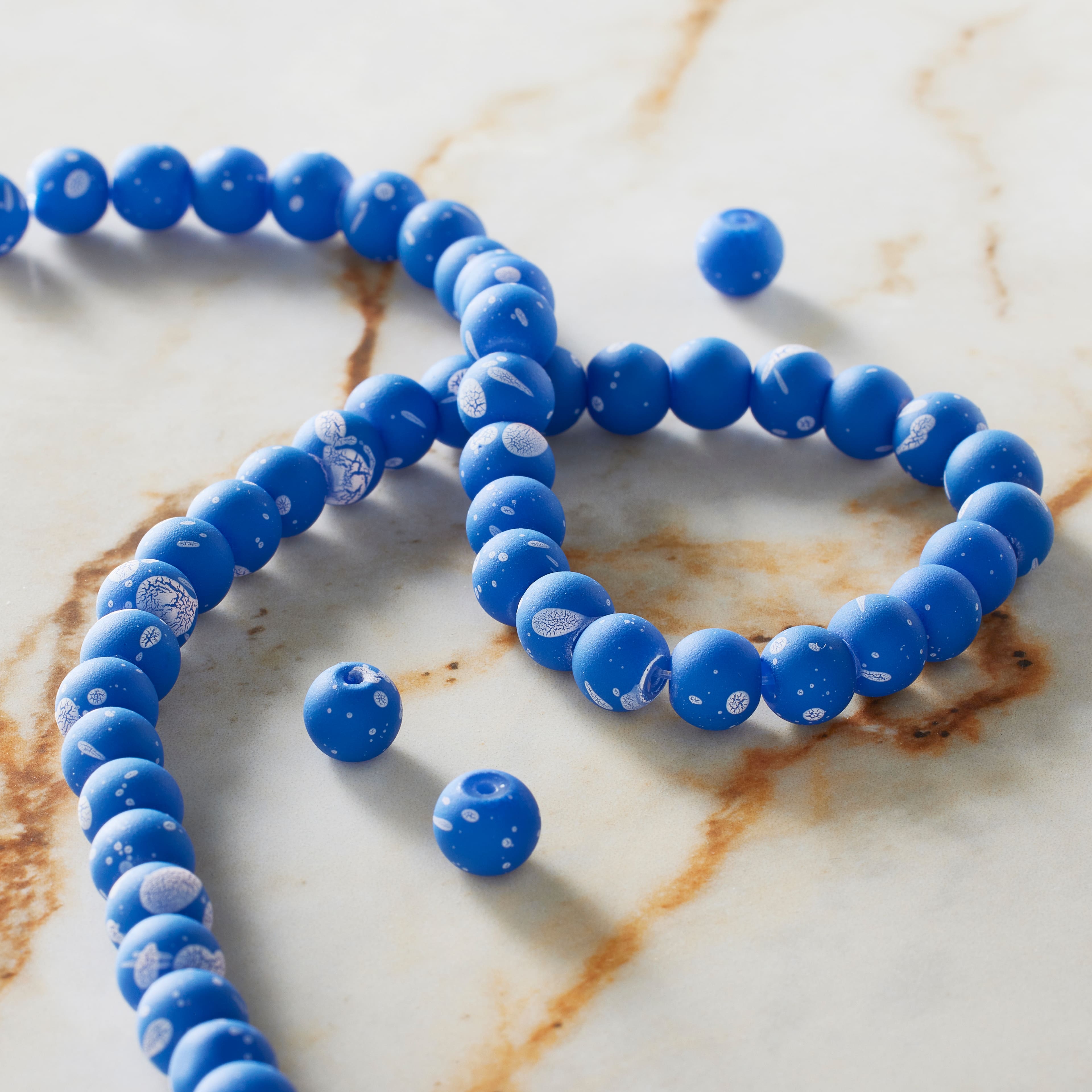 12 Pack: Blue & White Matte Glass Round Beads, 7mm by Bead Landing™