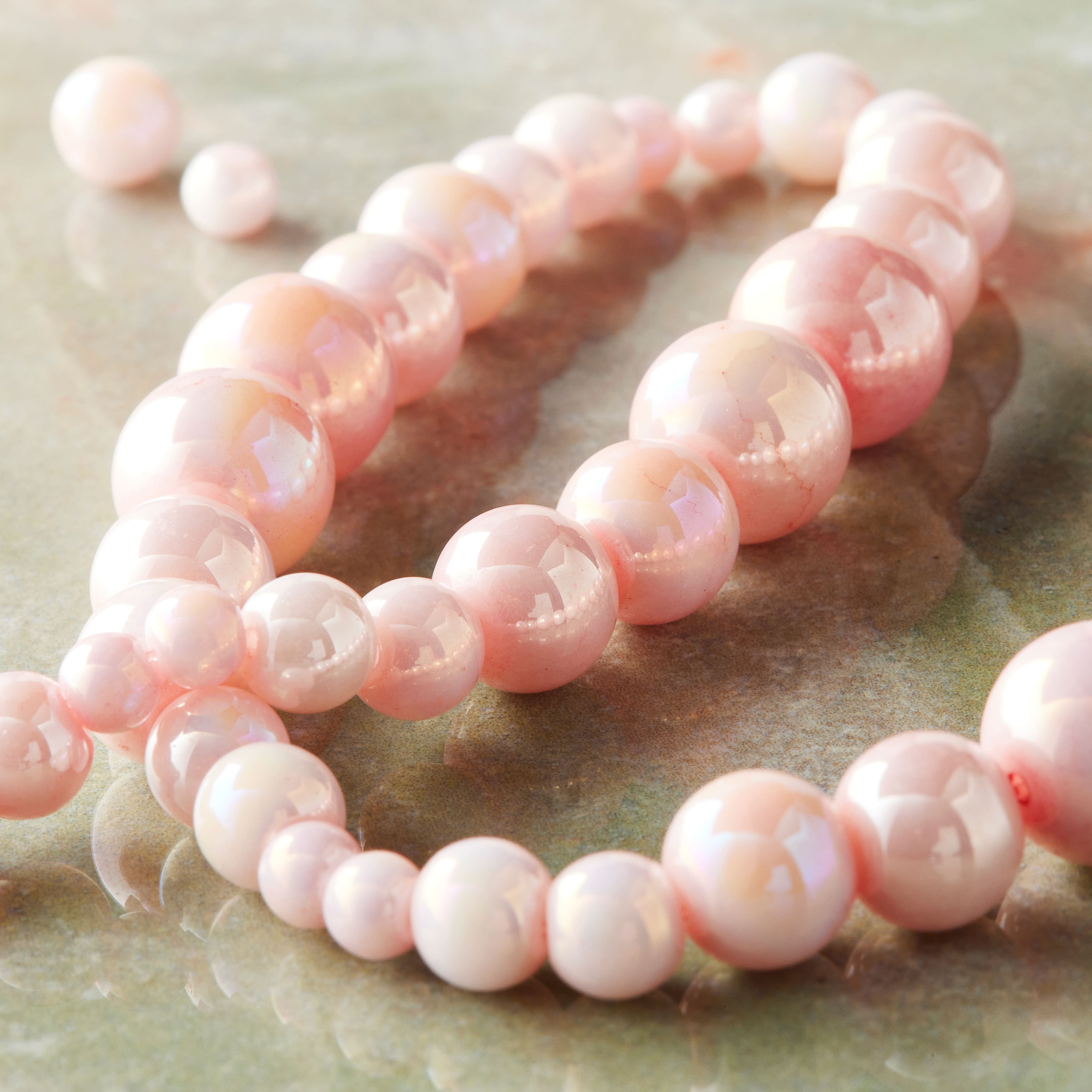 12 Pack: Pink Marble Glass Round Beads by Bead Landing™