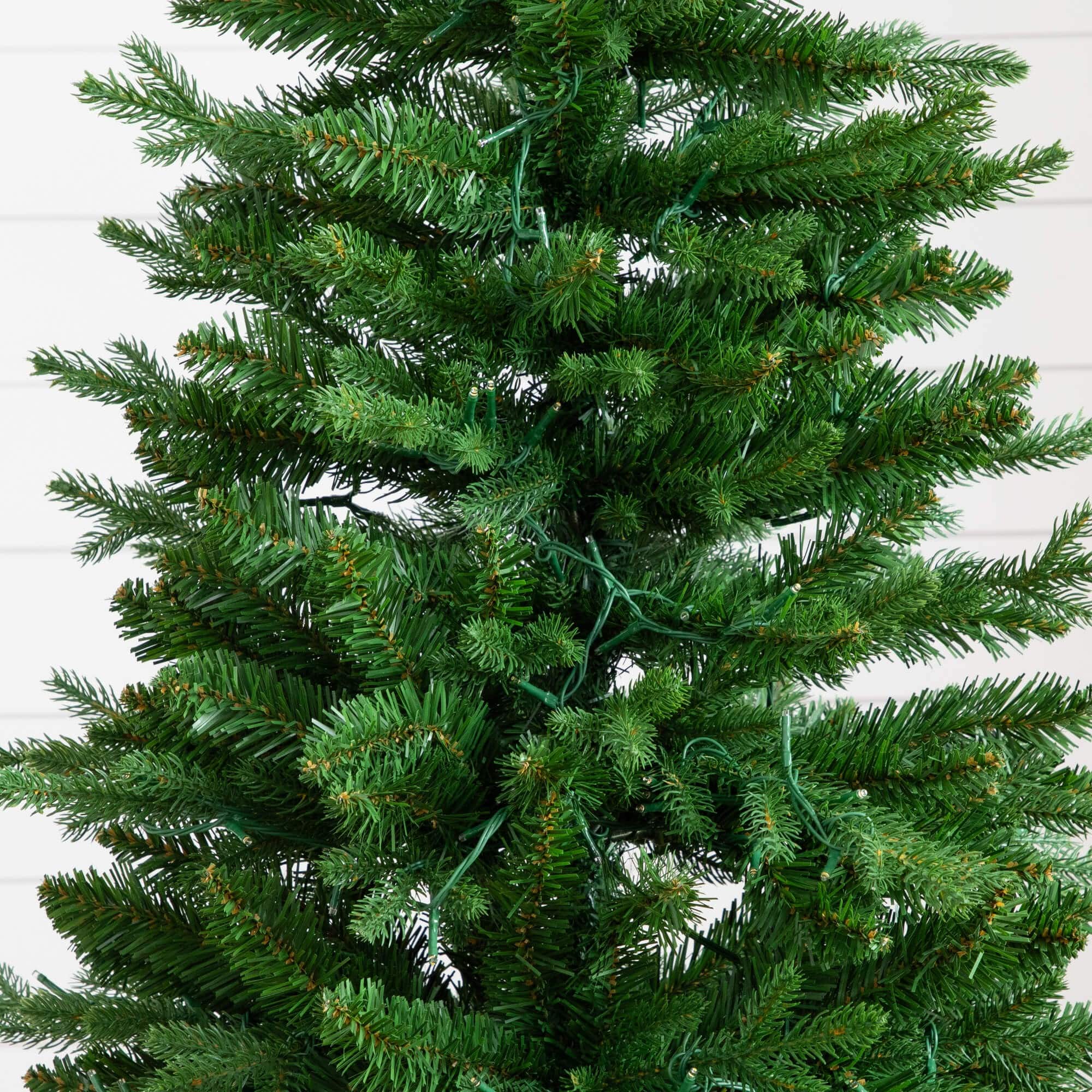 4.5ft. Pre-Lit Pine Artificial Christmas Tree in Decorative Planter with Clear LED Lights