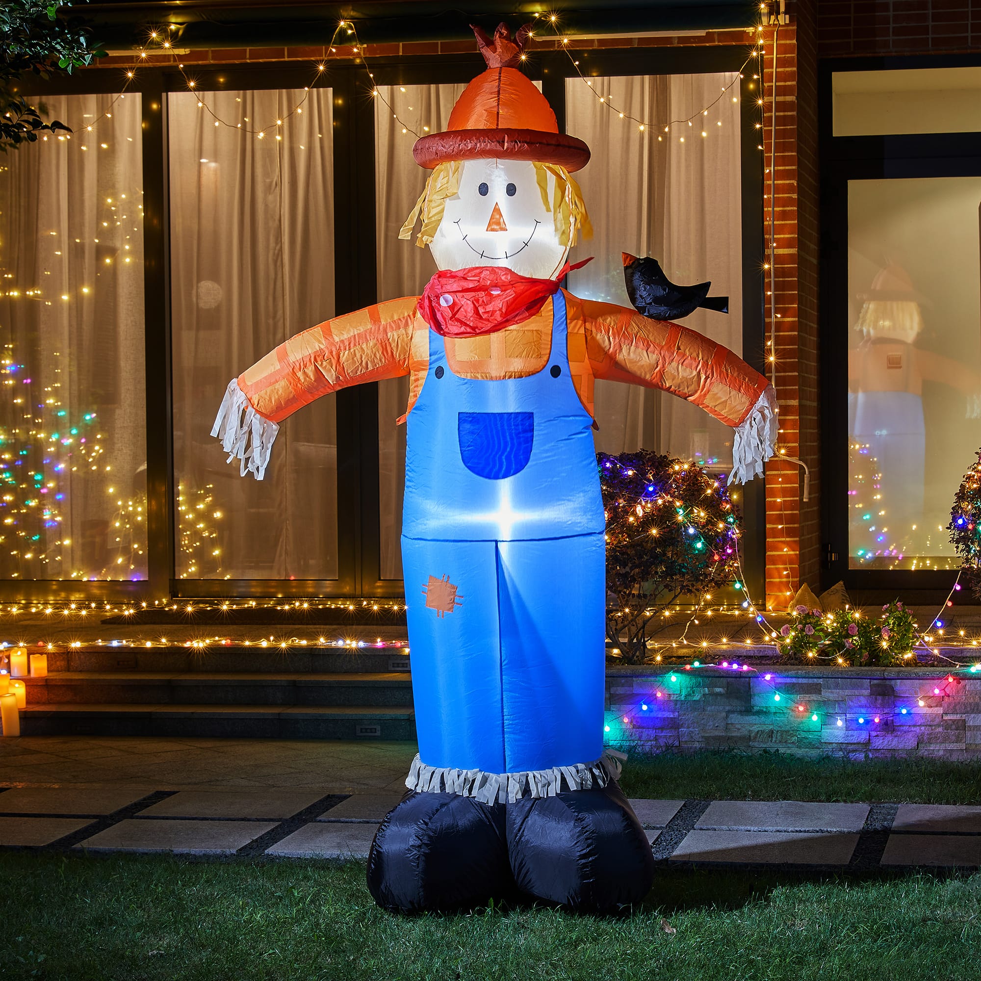 Glitzhome® 9ft. Lighted Inflatable Scarecrow Décor