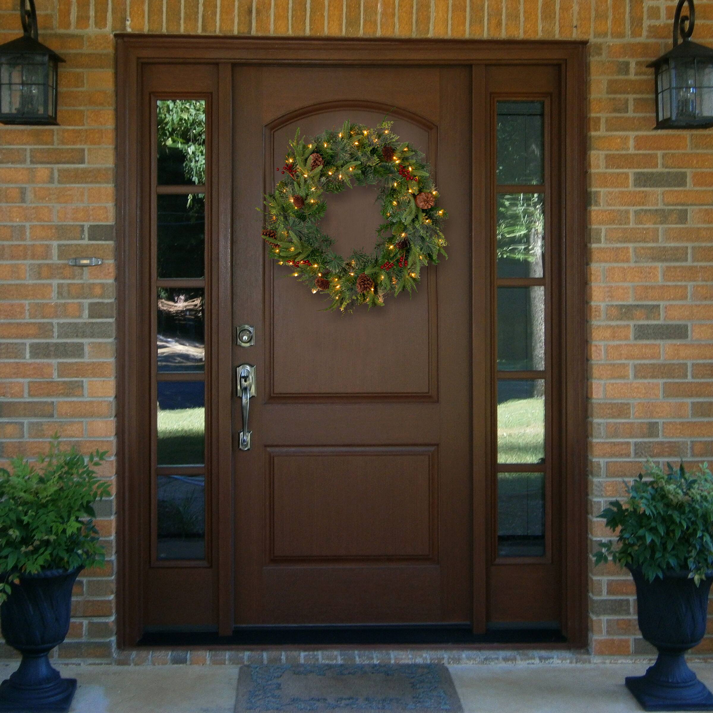 30&#x22; Feel Real&#xAE; Colonial Wreath with Berries, Cones &#x26; 50ct. Clear Lights