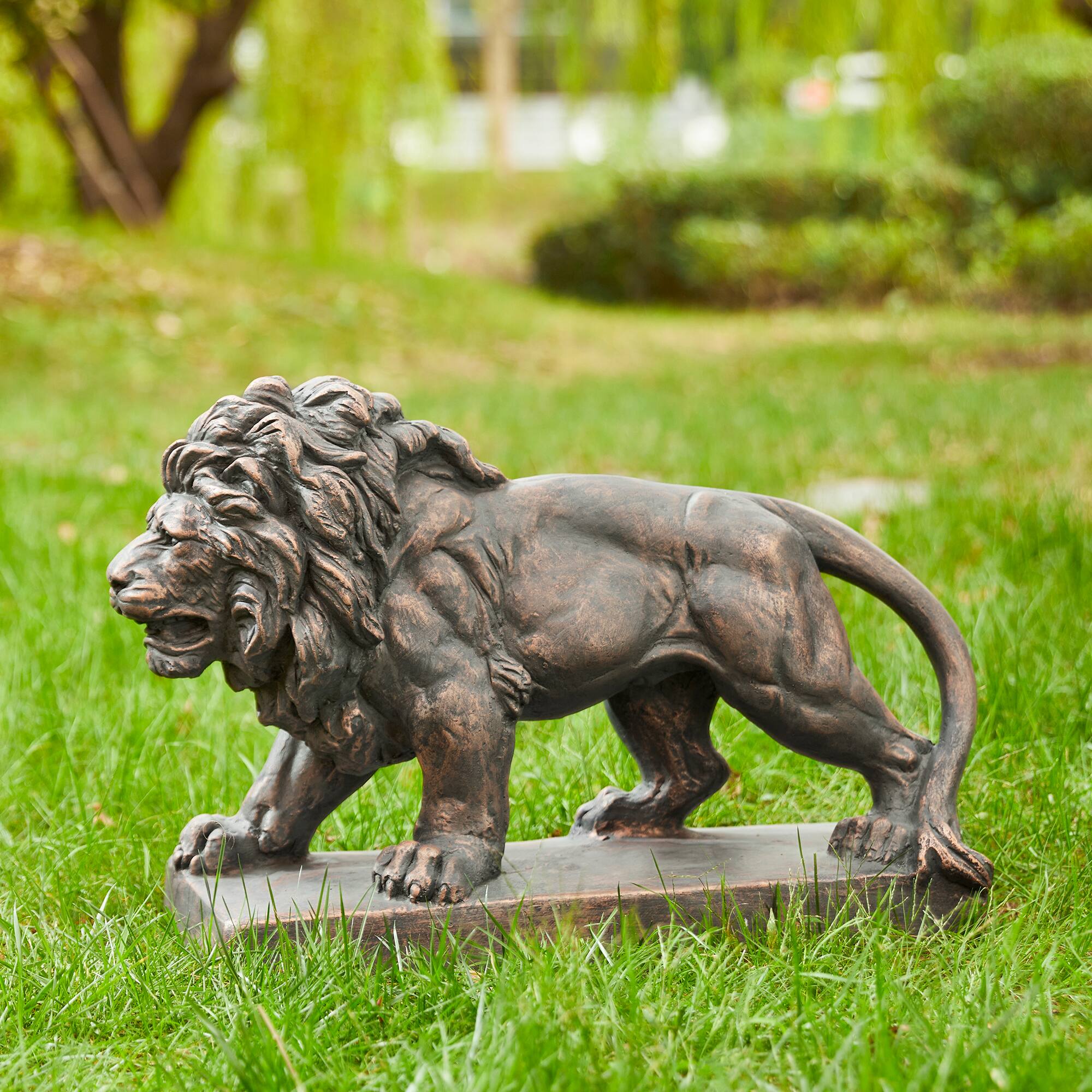 Glitzhome&#xAE; 24.5&#x22; Walking Lion Garden Statue