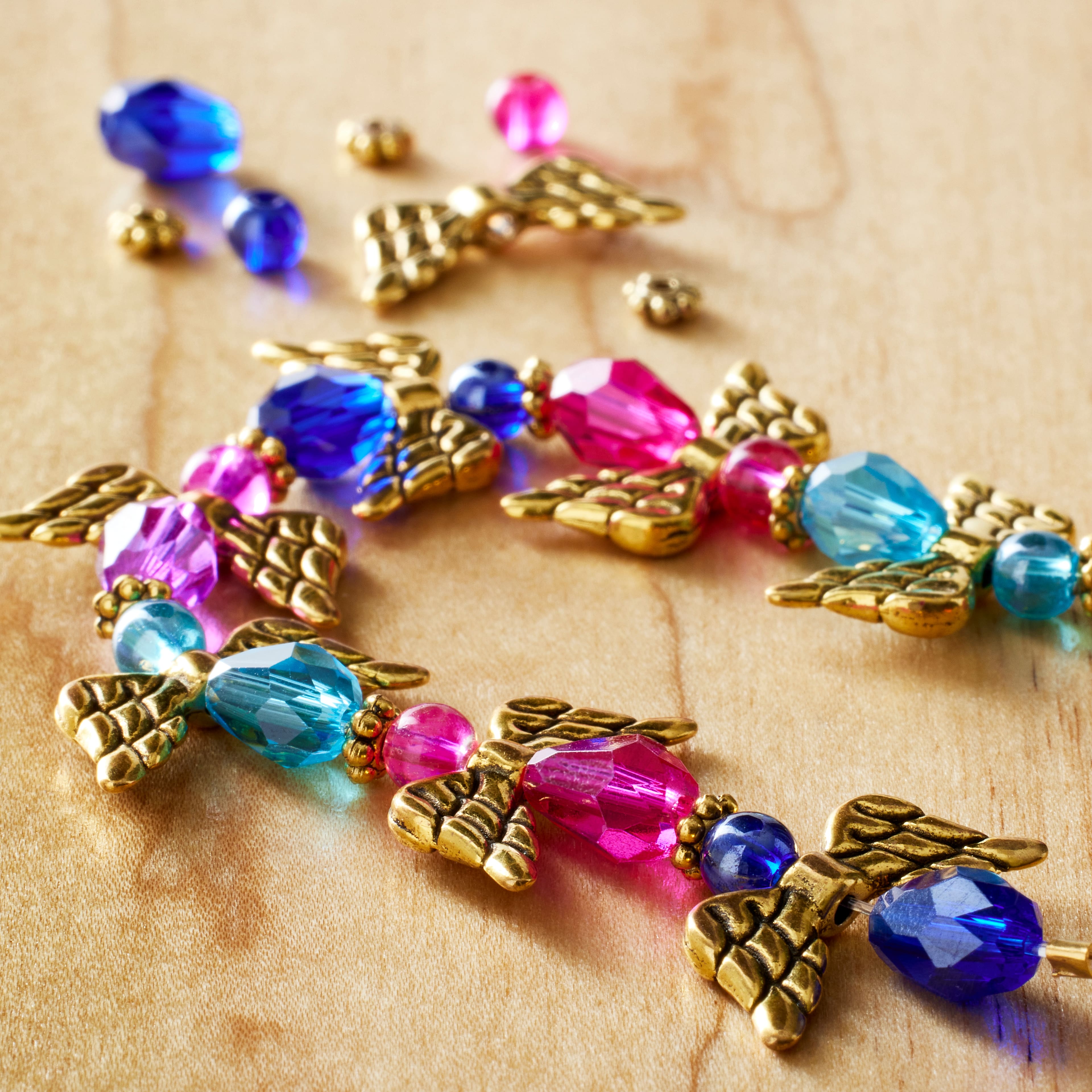 12 Pack: Blue & Purple Metal & Glass Angel Beads by Bead Landing™