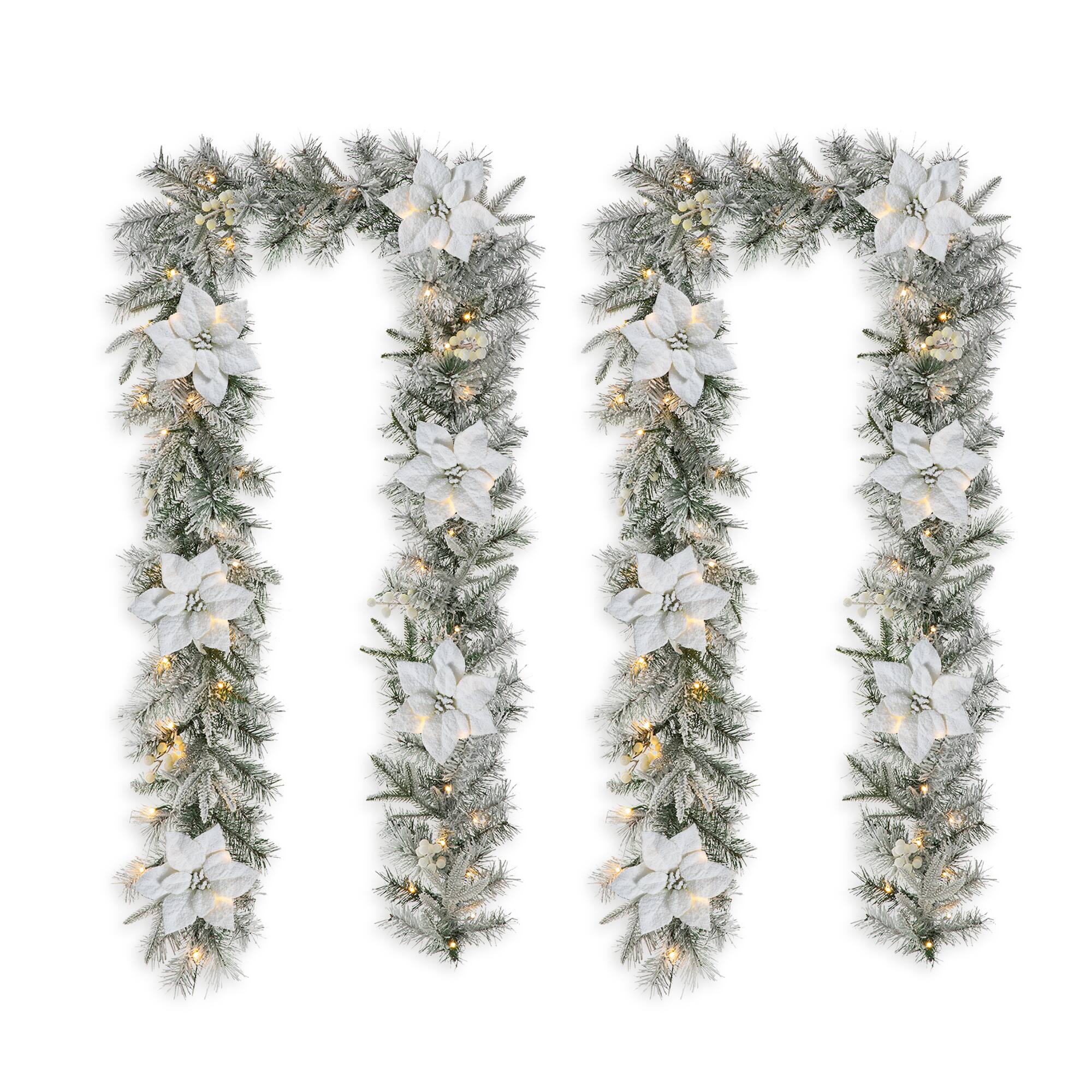 Glitzhome® 9ft. Pre-Lit Snow-Flocked Greenery Pine & Poinsettia Christmas Garlands, 2ct.