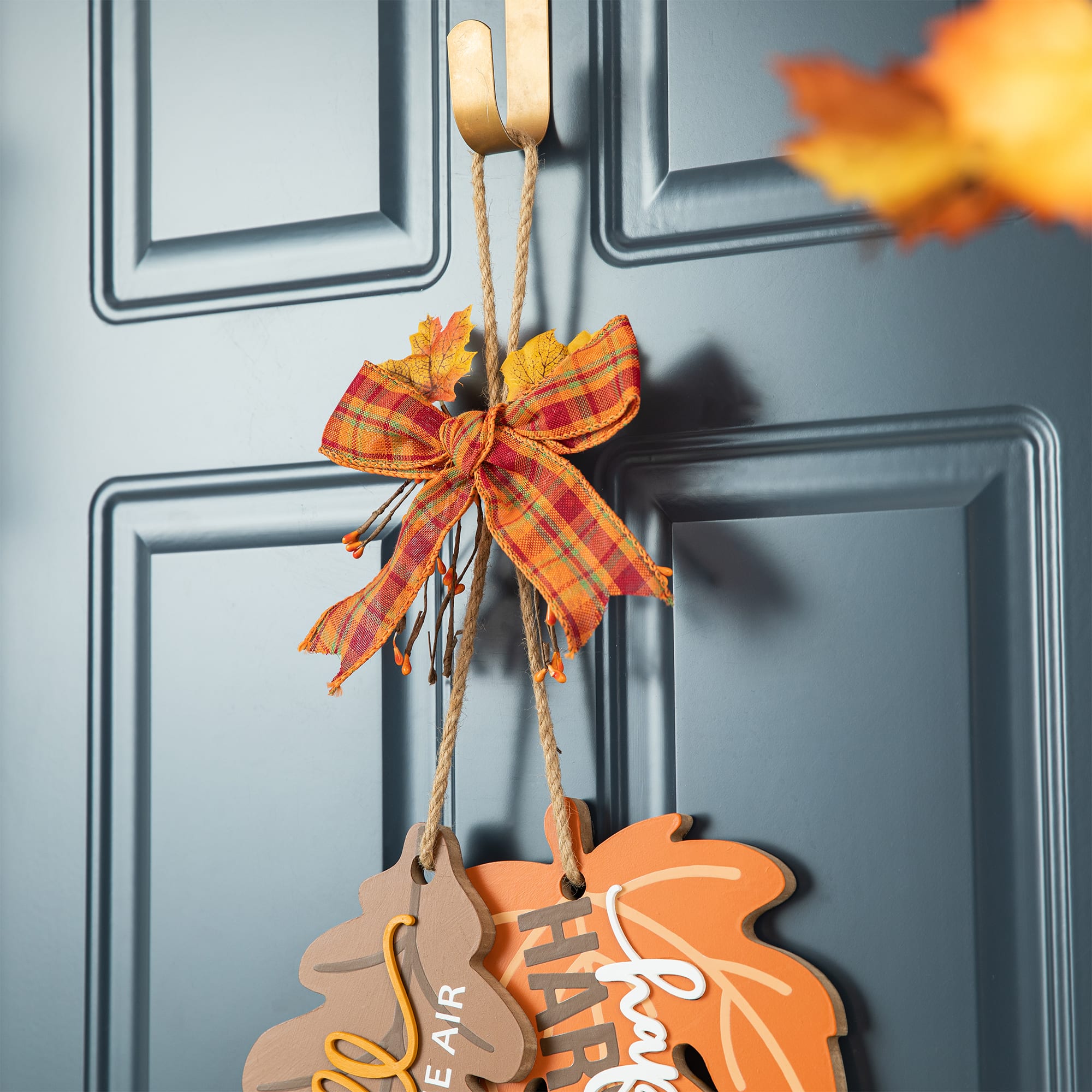Glitzhome® 24.5" Fall Wood Maple Leaves with Bowknot Door Hanger