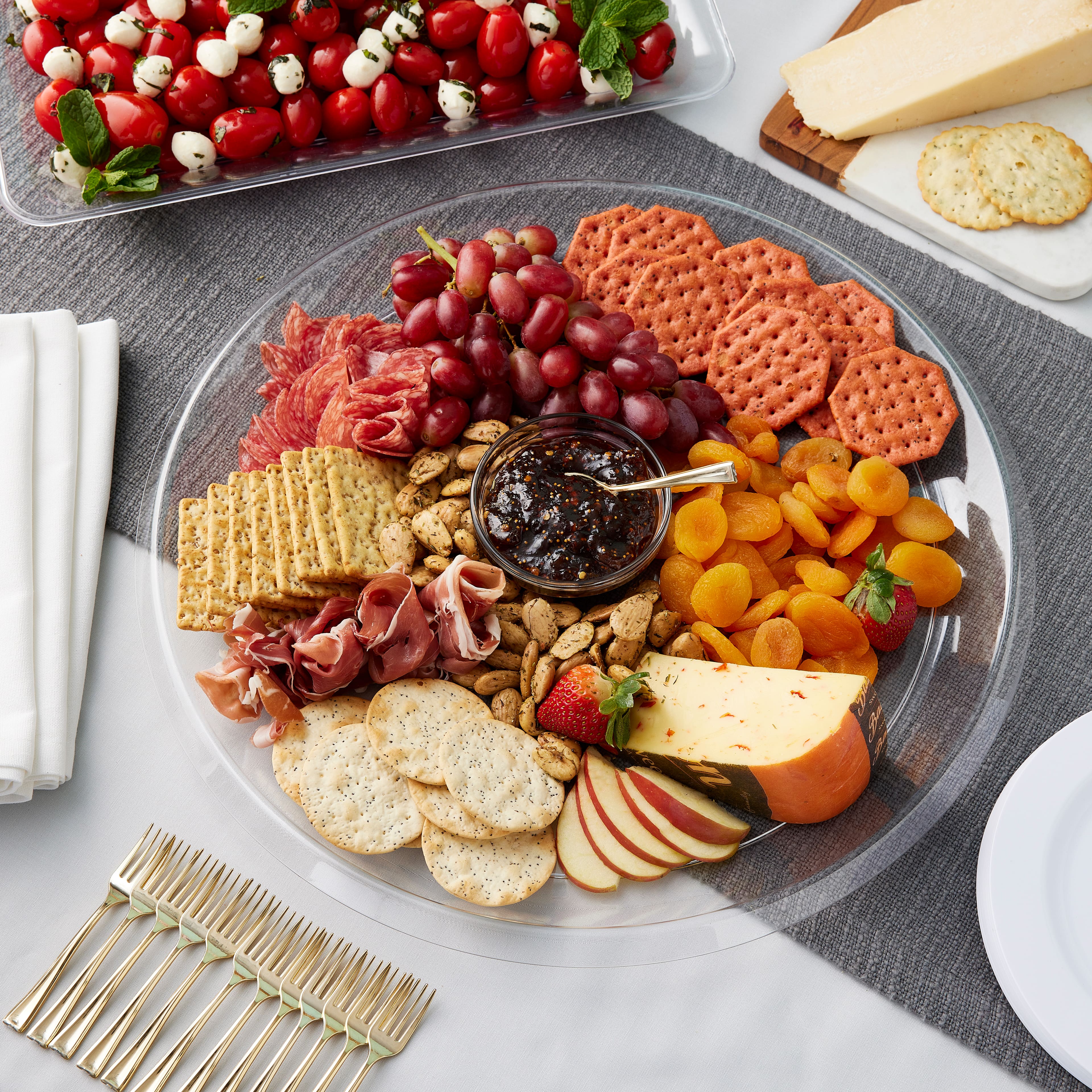 12 Pack: 16&#x22; Clear Round Platter by Celebrate It&#x2122;