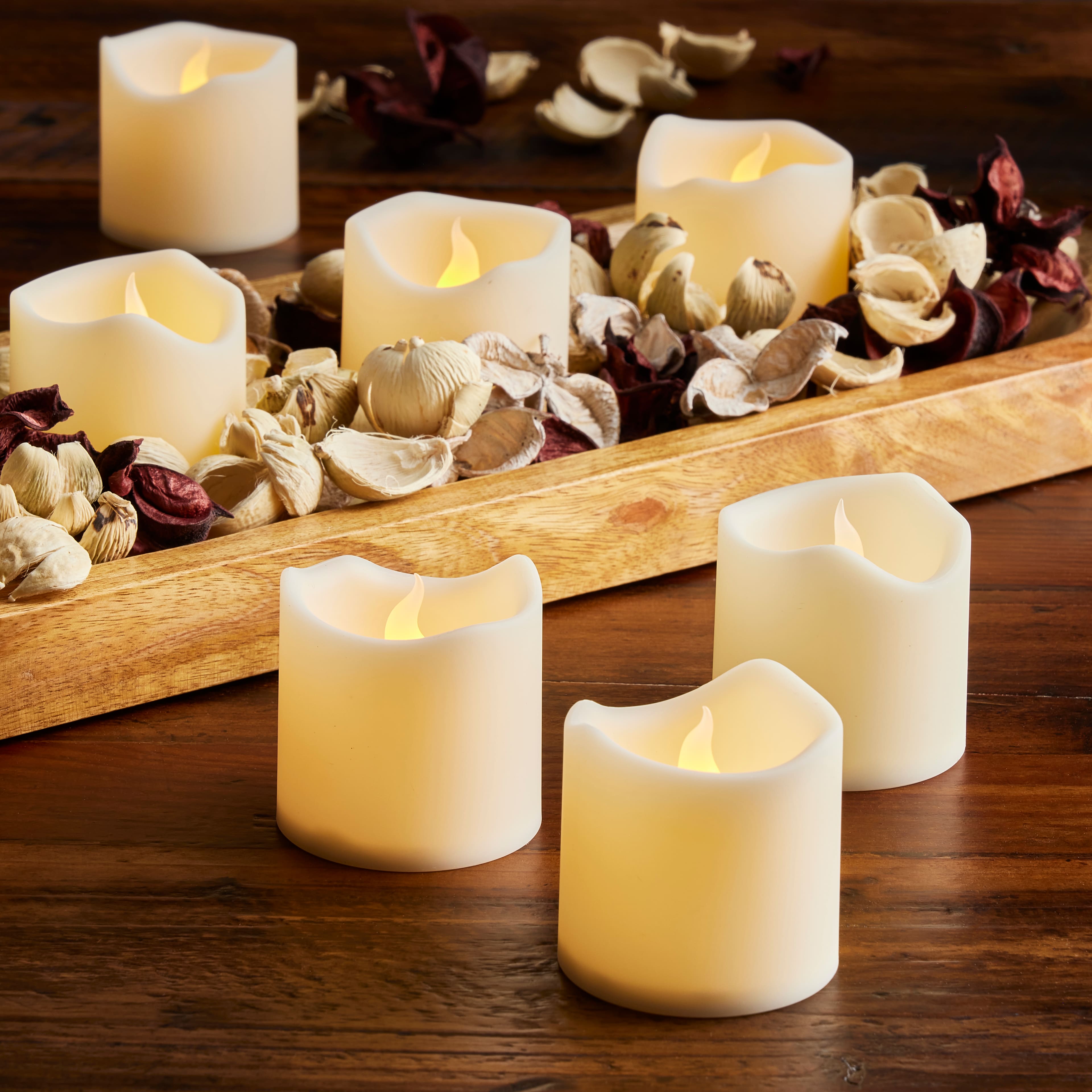 8 Packs: 8 ct. (64 total) Basic Elements™ Ivory LED Votives by Ashland®