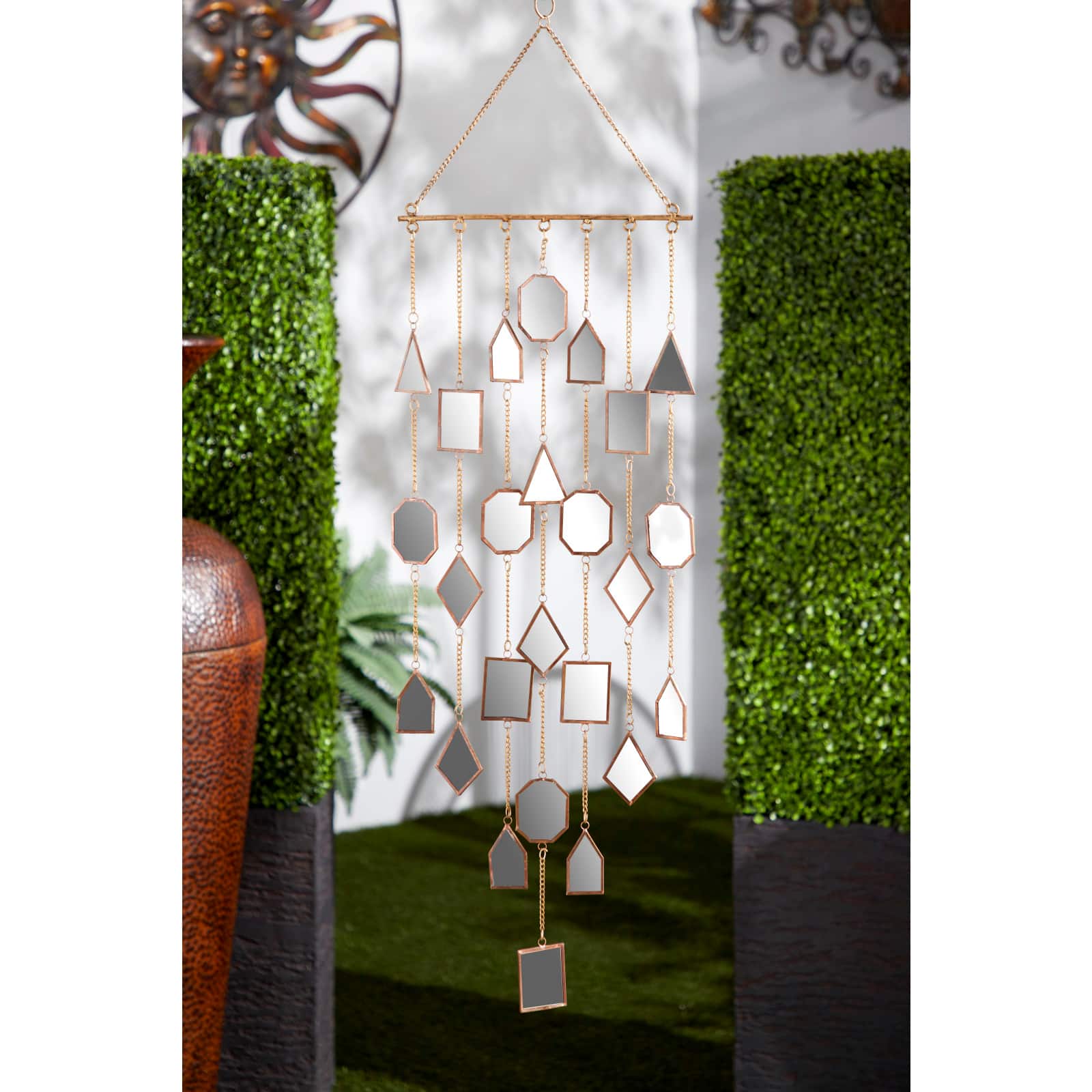 The Novogratz 32" Brown Metal Eclectic Mirror Wind Chime