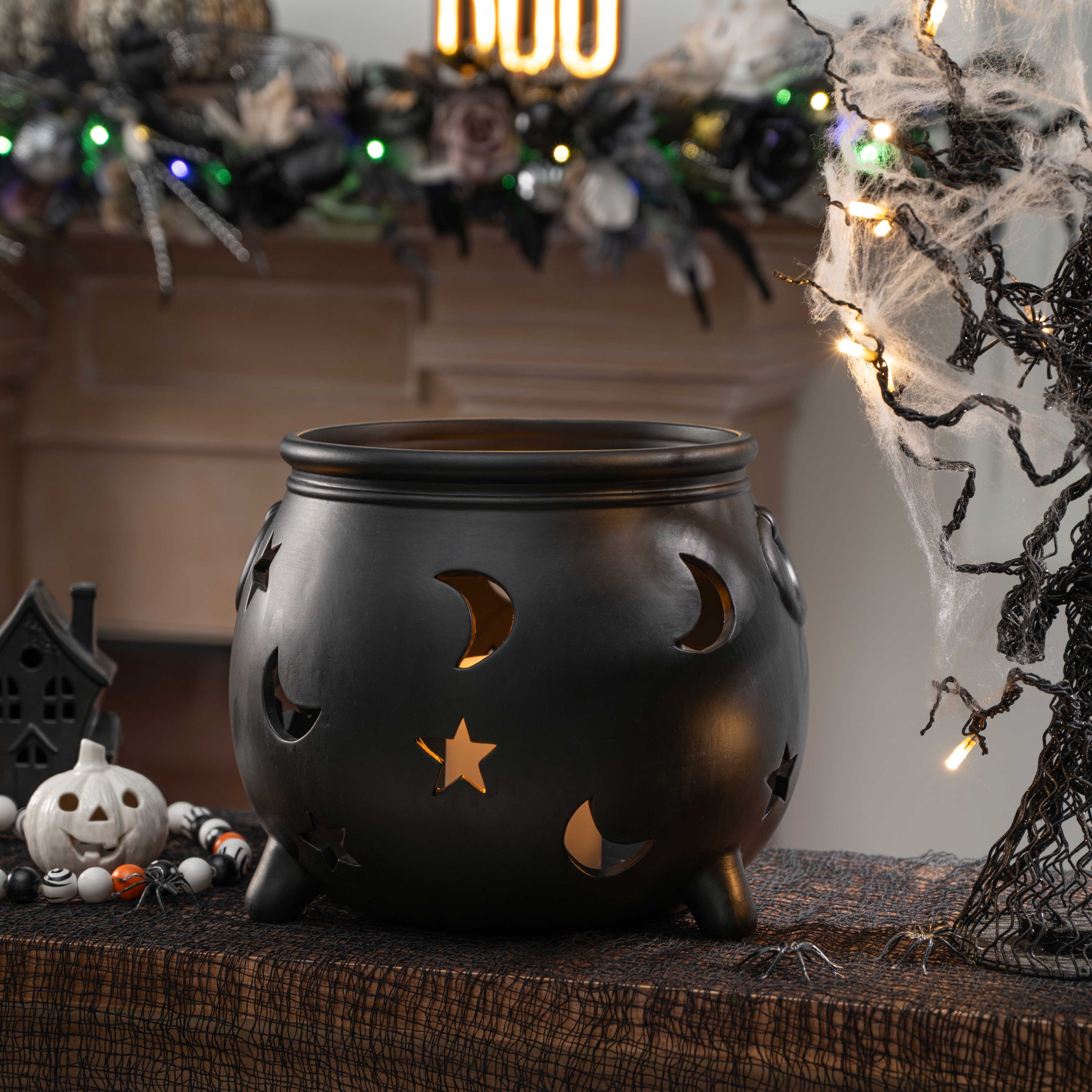 10.75&#x22; Black Moon &#x26; Stars Cauldron Ceramic Candle Holder by Ashland&#xAE;