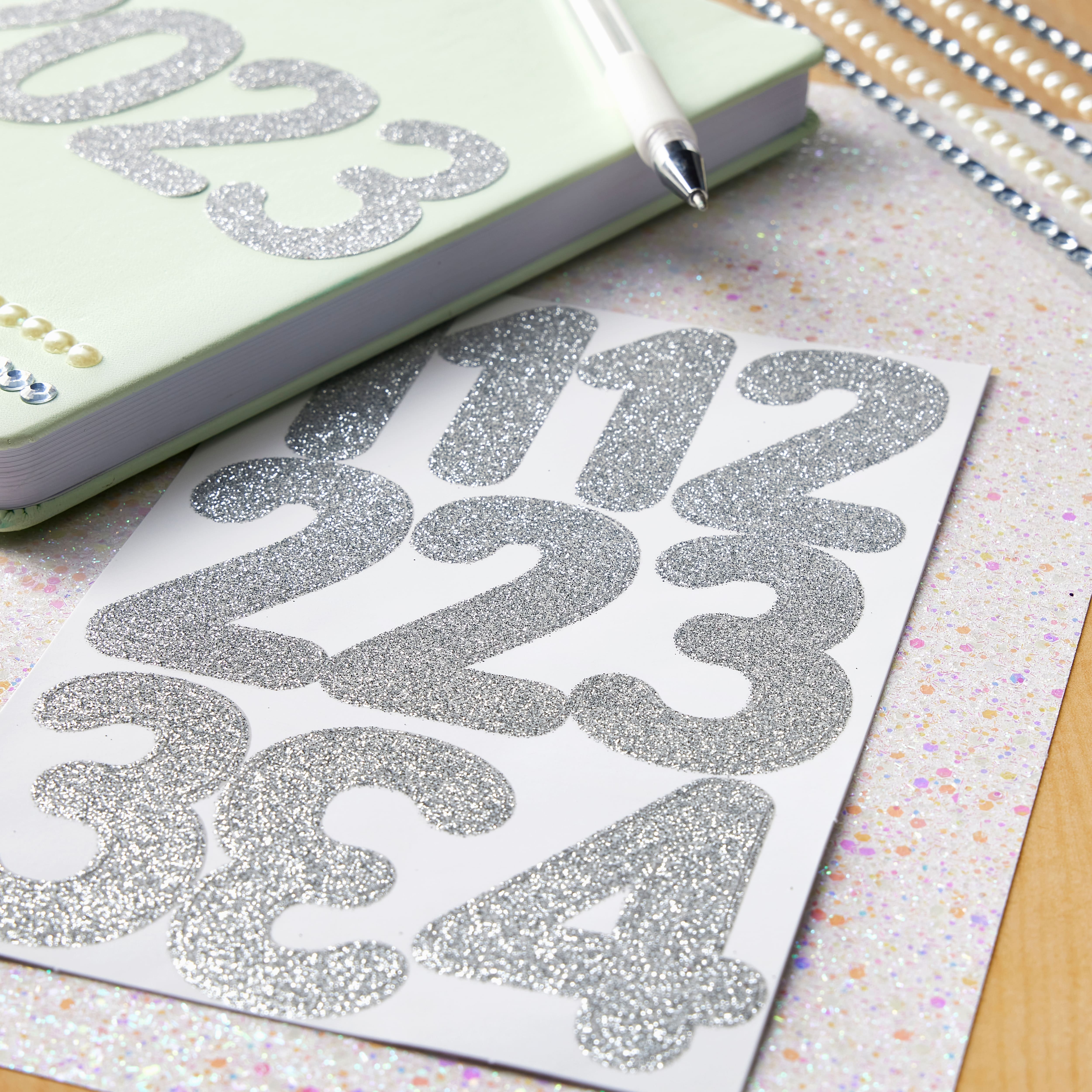 12 Pack: Silver Glitter Rounded Number Stickers by Recollections™