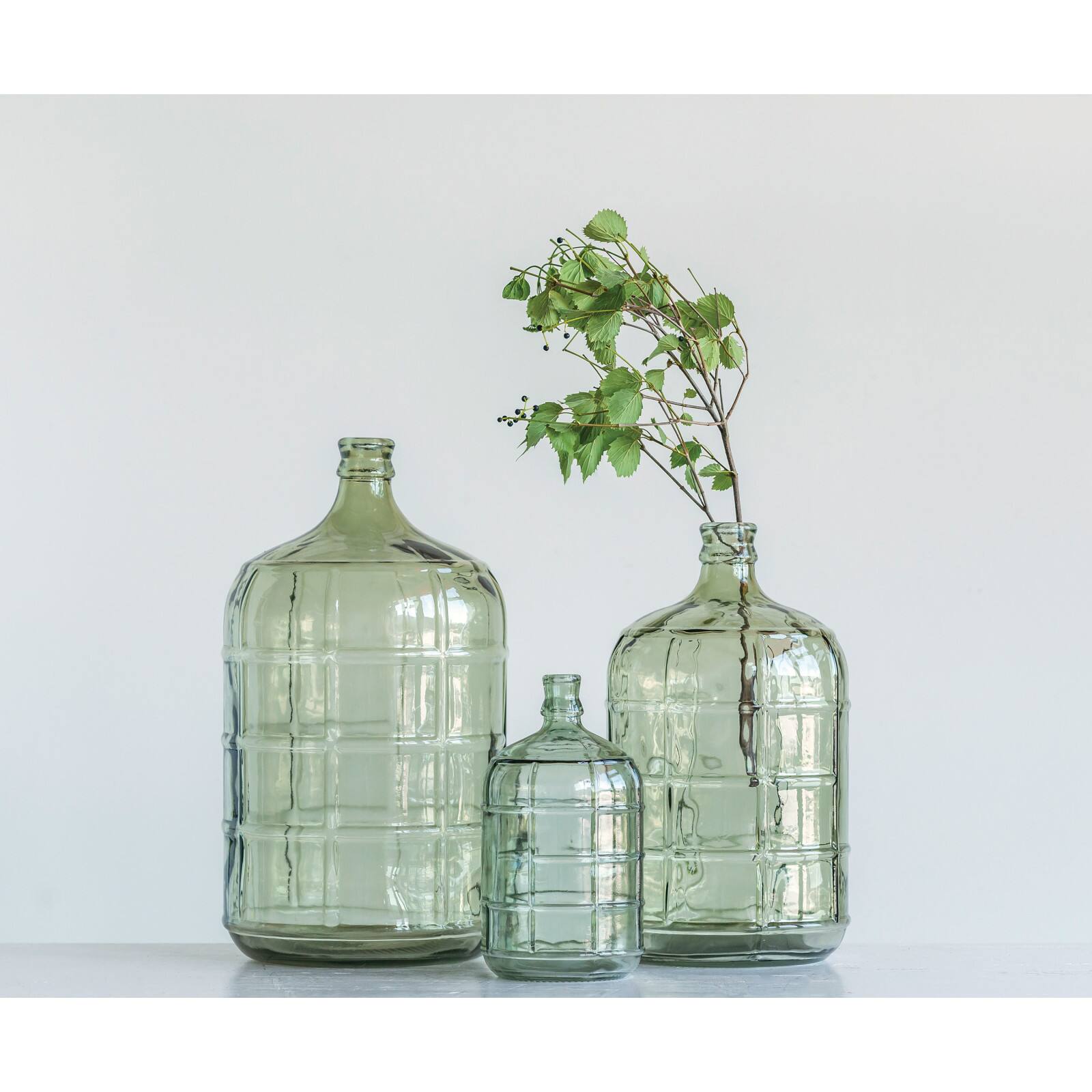 Hello Honey&#xAE; 19.25&#x22; Transparent Green Vintage Glass Bottle with Embossed Windowpane Design