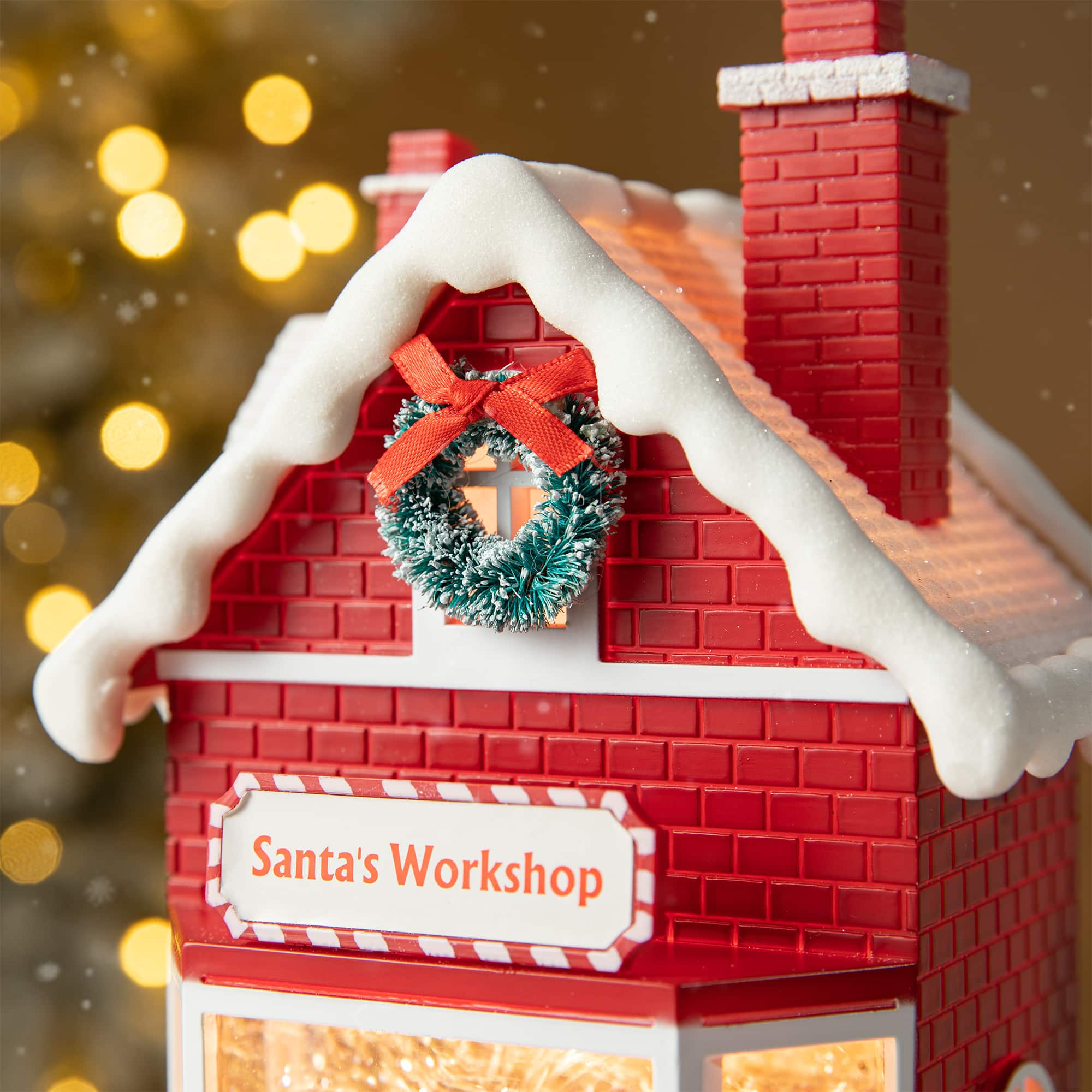 Glitzhome&#xAE; 10.5&#x22; Lighted Santa&#x27;s Workshop Waterglobe