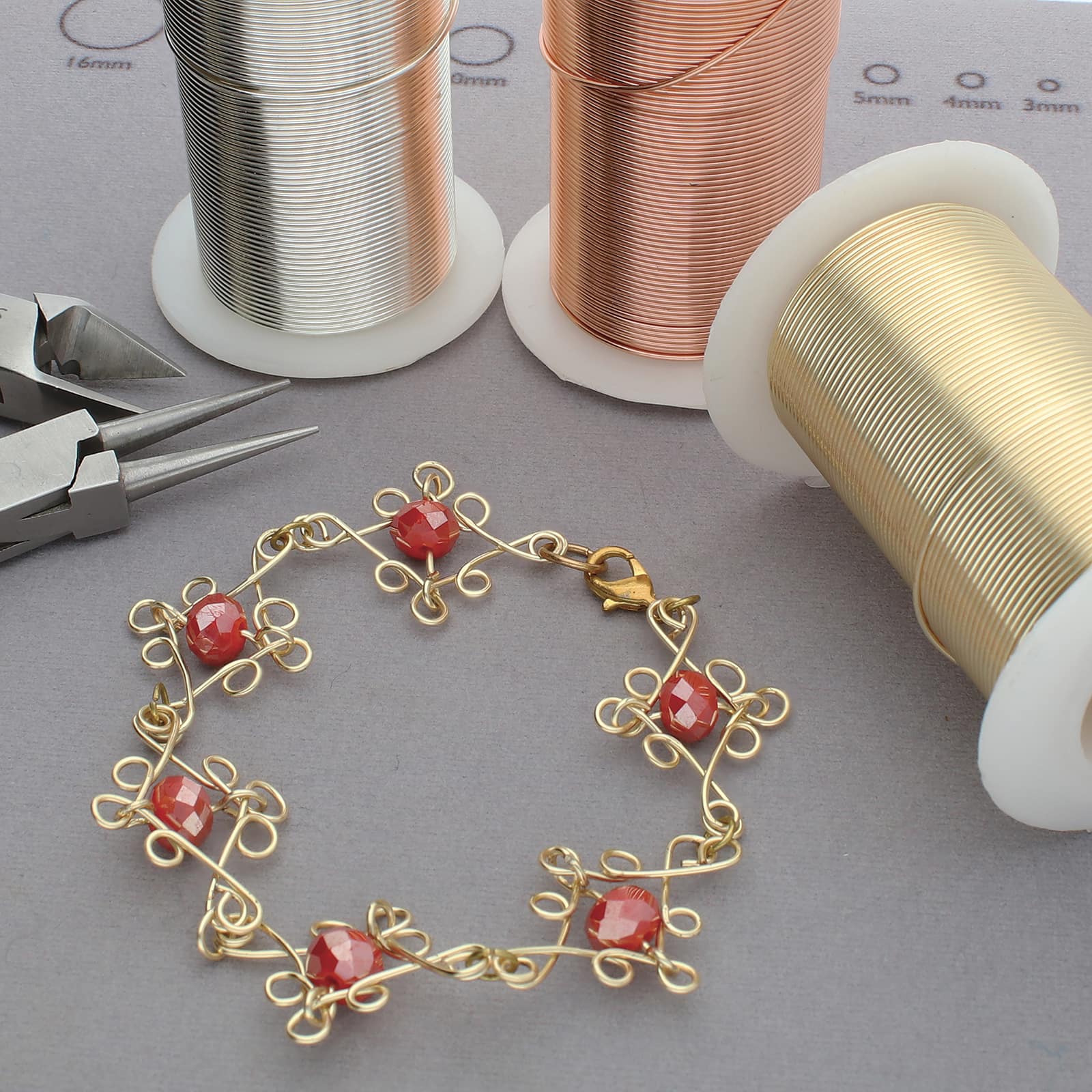 The Beadsmith&#xAE; Wire Elements&#x2122; 25 Gauge Tarnish Resistant Medium Temper Gold, Silver &#x26; Copper Wire, 12ct.
