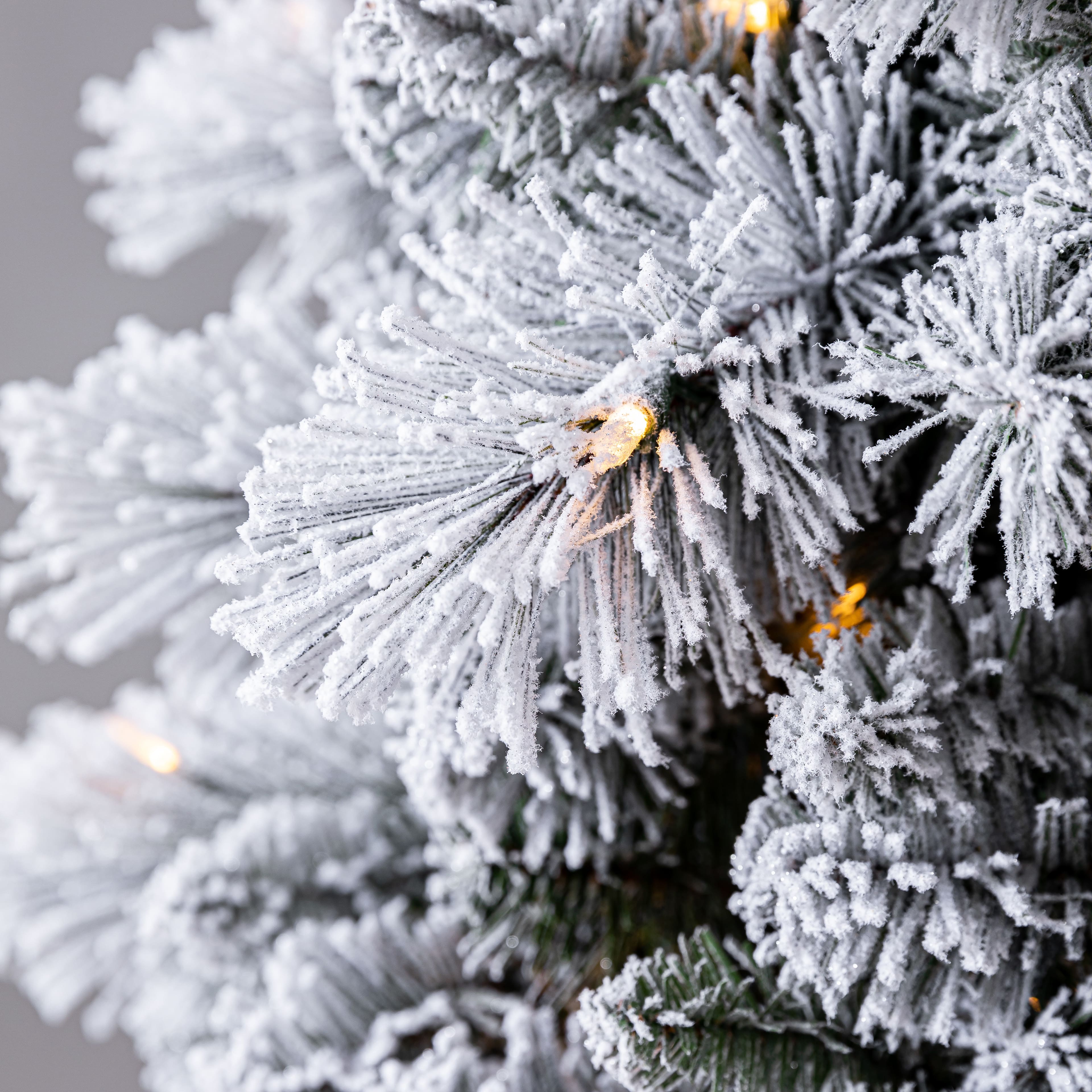 7ft. Pre-Lit Flocked Slim Artificial Christmas Tree, Warm White Twinkle LED Lights by Ashland&#xAE;
