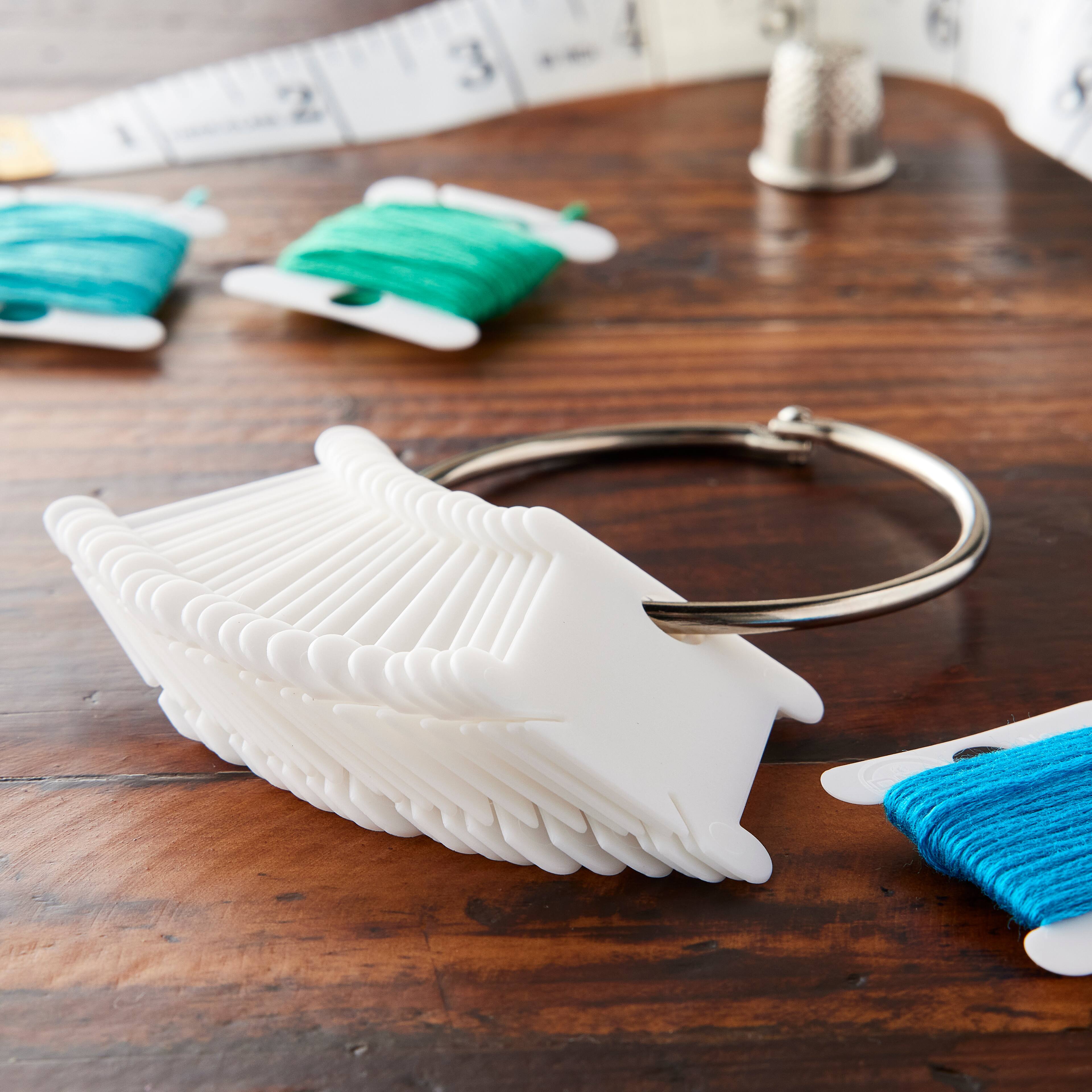 24 Packs: 29 ct. (696 total) DMC® Floss Bobbins with Metal Ring