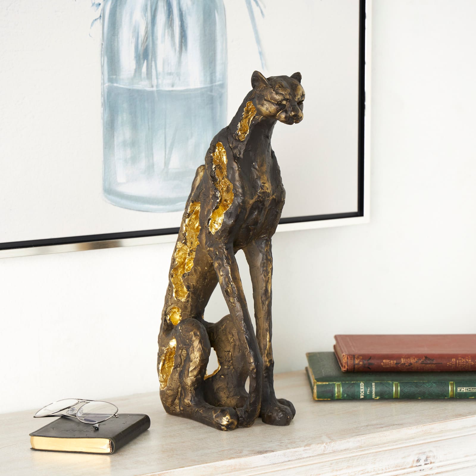 19" Bronze Polystone Distressed Textured Sitting Leopard Sculpture with Cutouts & Gold Accents