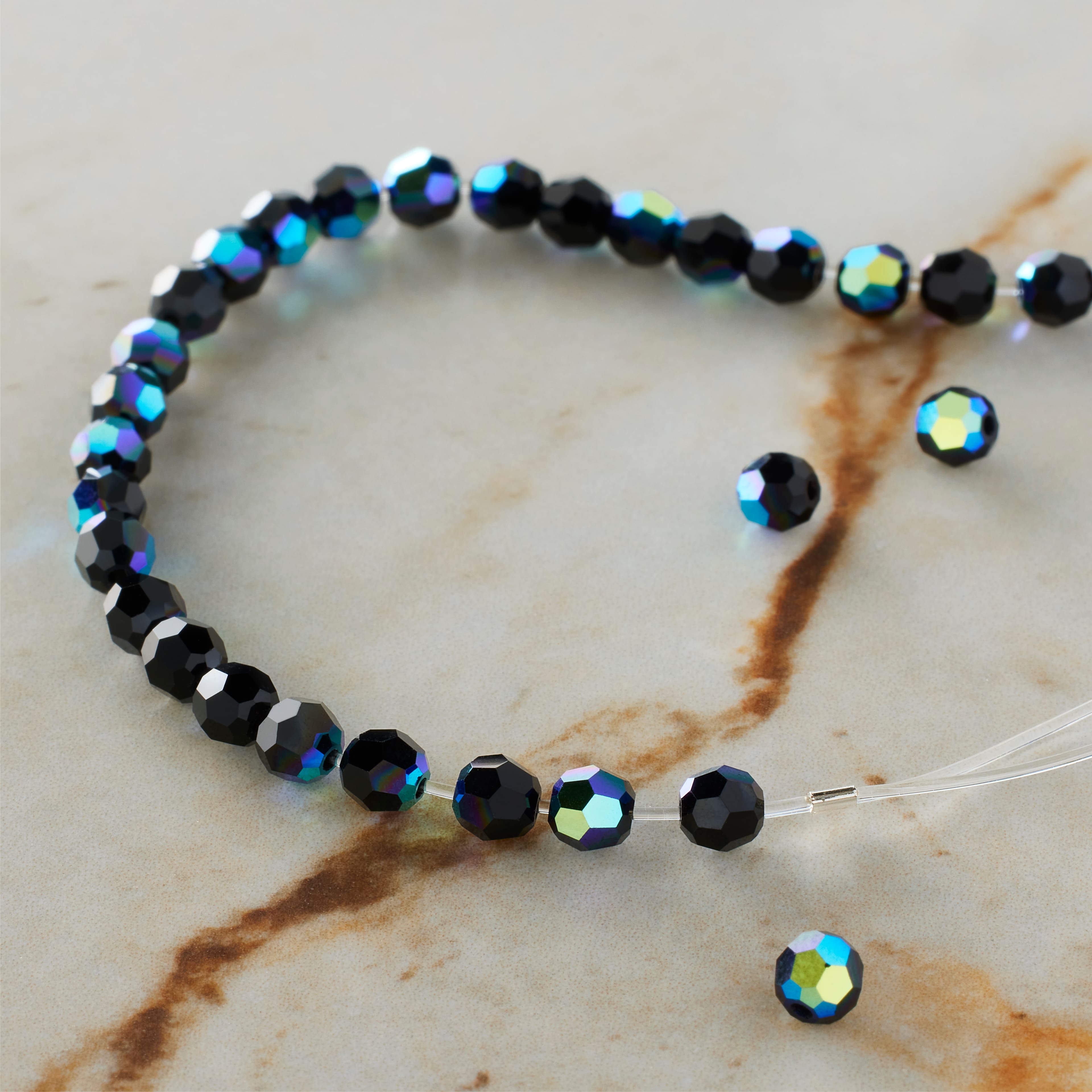 12 Packs: 31 ct. (372 total) Preciosa Glass Crystal Round Beads, 4mm by Bead Landing™