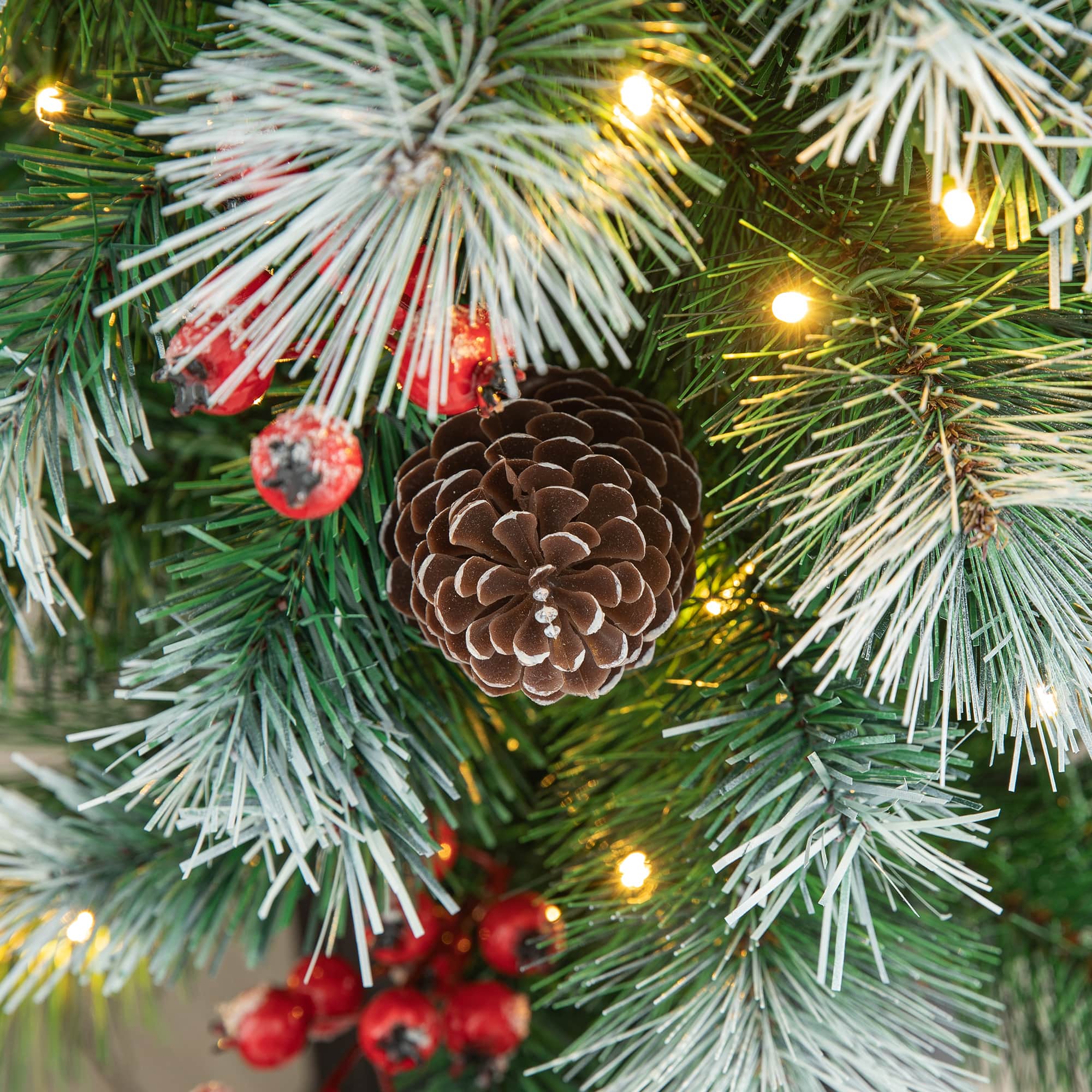 Glitzhome&#xAE; 4ft. Pre-Lit Pine Artificial Christmas Porch Tree, Warm White LED Lights