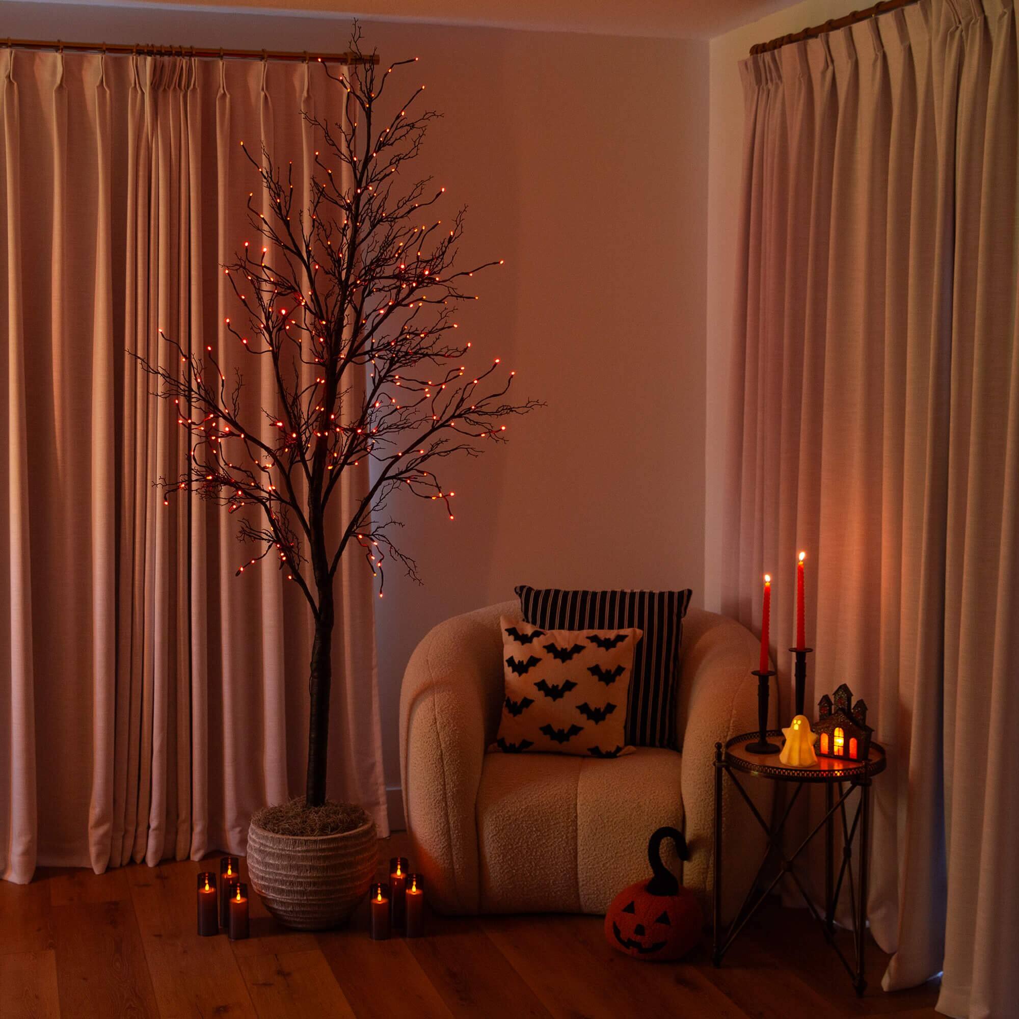 8ft. Pre-Lit Halloween Deluxe Black Twig Artificial Tree with 216 Orange &#x26; Purple LED Lights