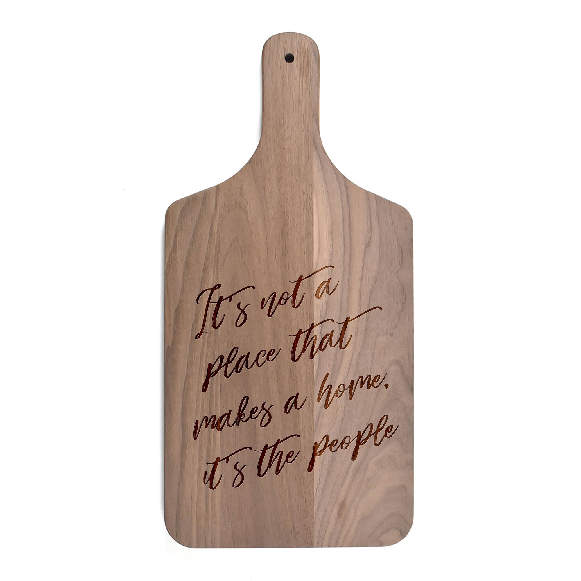 17" It's Not a Place That Makes a Home Walnut Paddle Cutting Board
