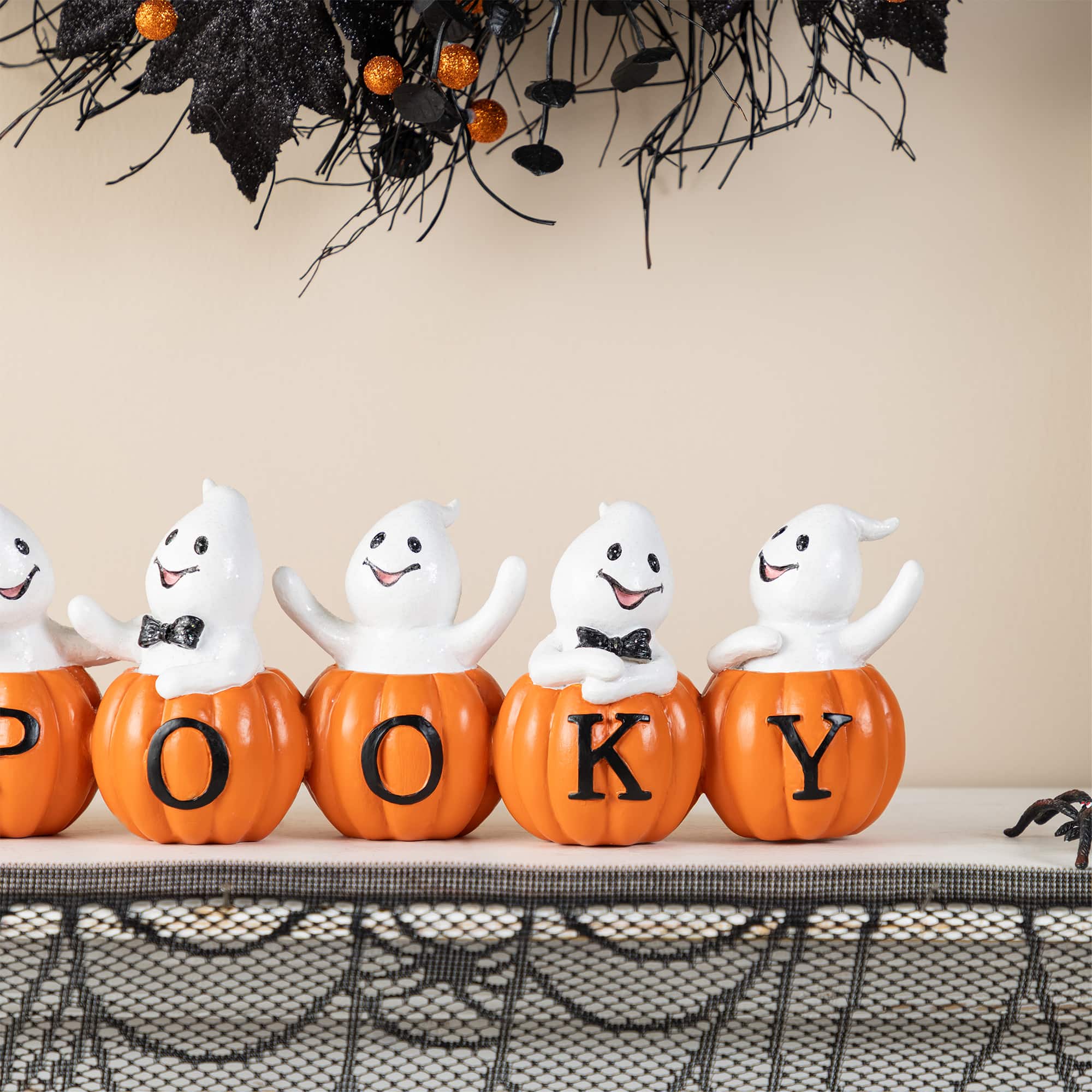 Glitzhome&#xAE; 15.5&#x22;L Halloween Polyresin SPOOKY Ghost Pumpkin Table Decor