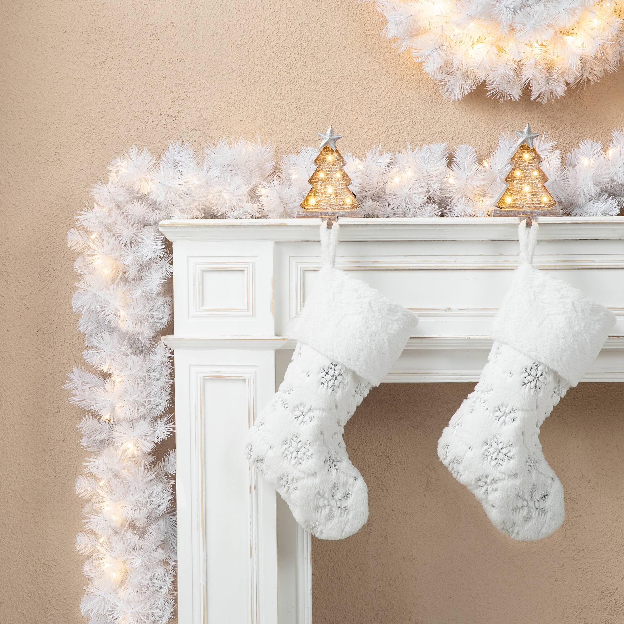 Glitzhome&#xAE; 9ft. Pre-Lit White Pine Christmas Garland with LED Lights and Timer