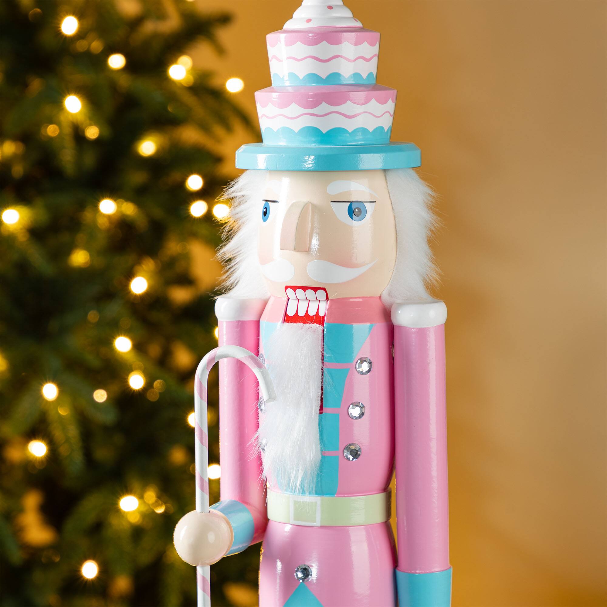Glitzhome&#xAE; 24&#x22;H Wooden Christmas Pink Cake Nutcracker