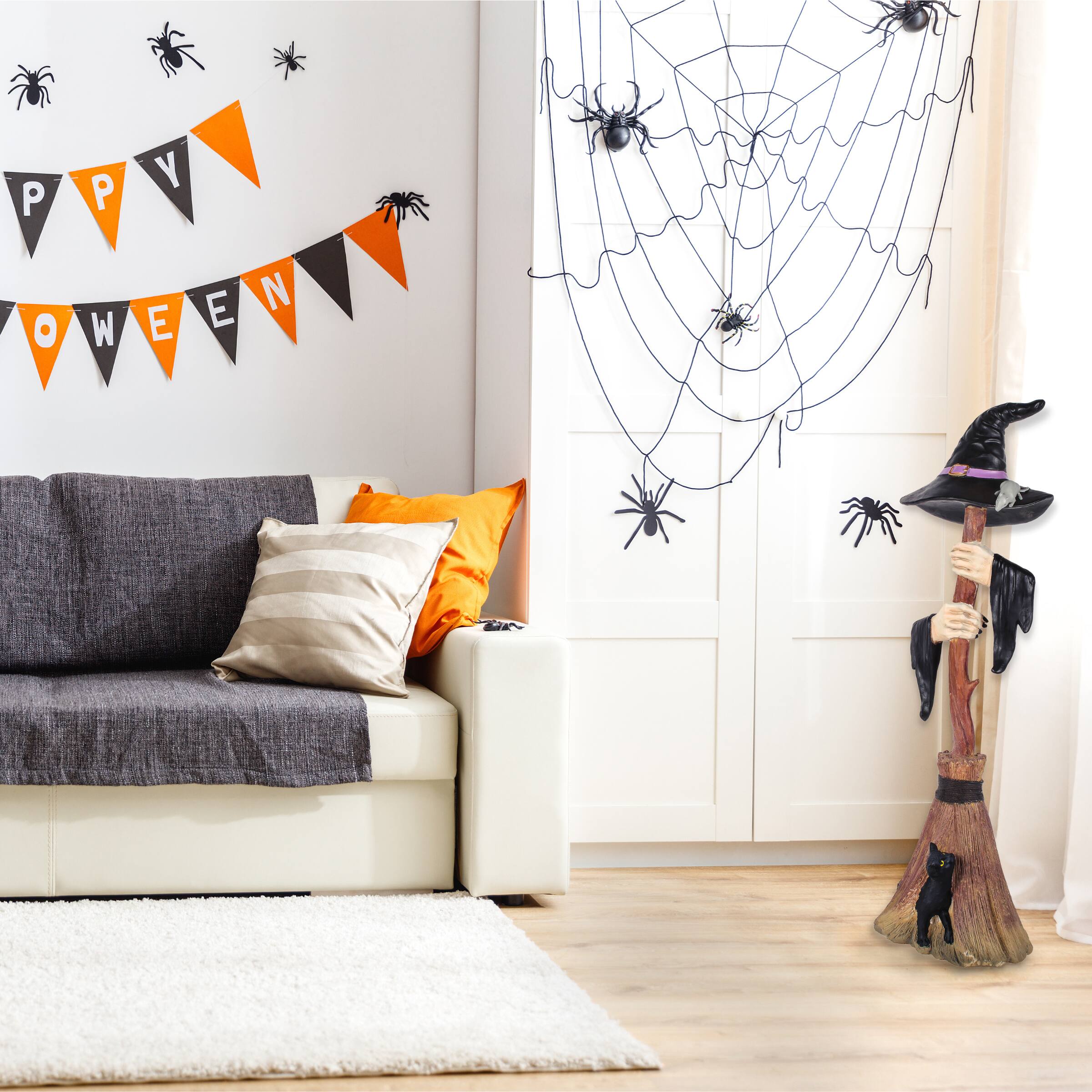 4ft. Broom with Arms & Witch Hat Décor