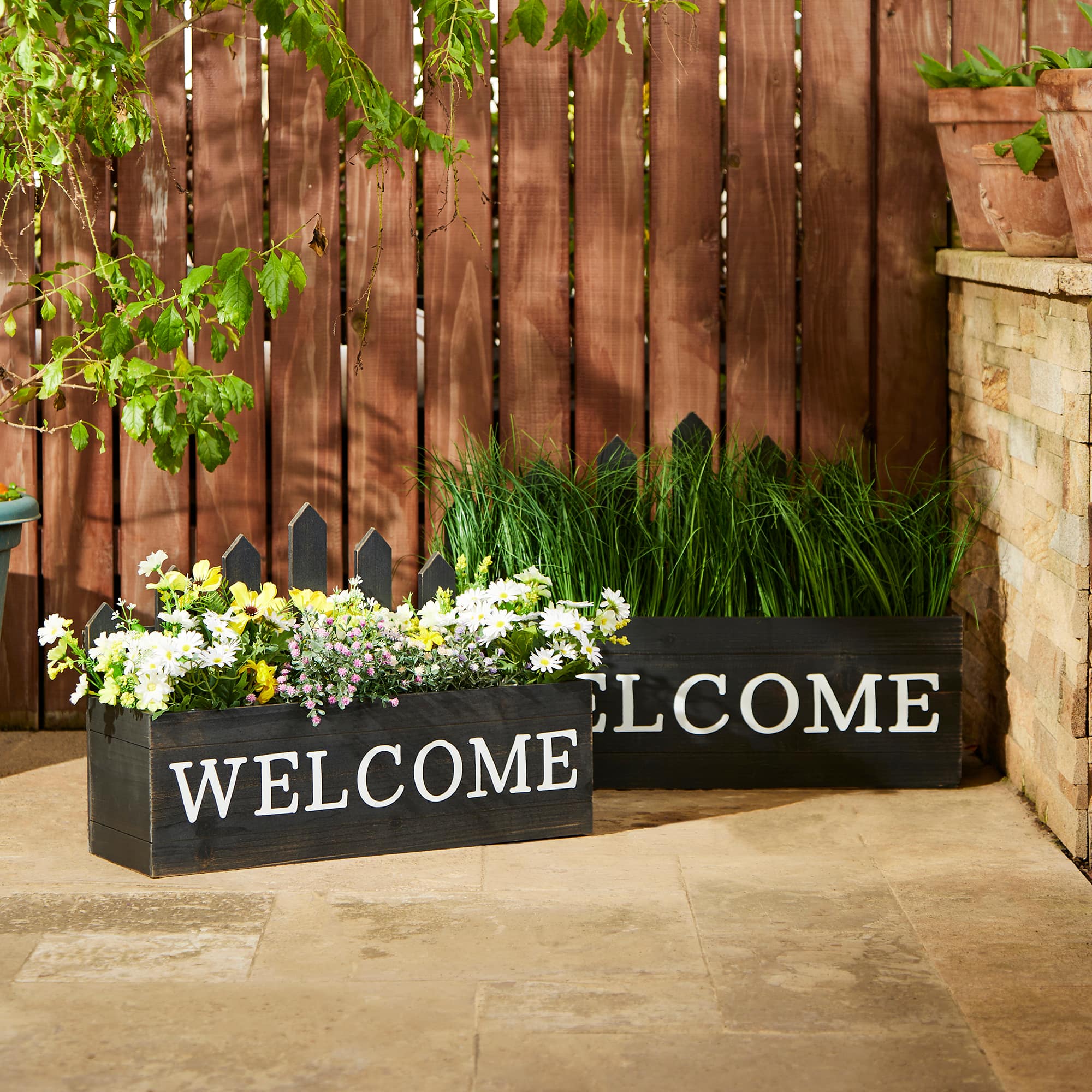 Glitzhome&#xAE; Black Wood WELCOME Fence-Inspired Planter Stand Set