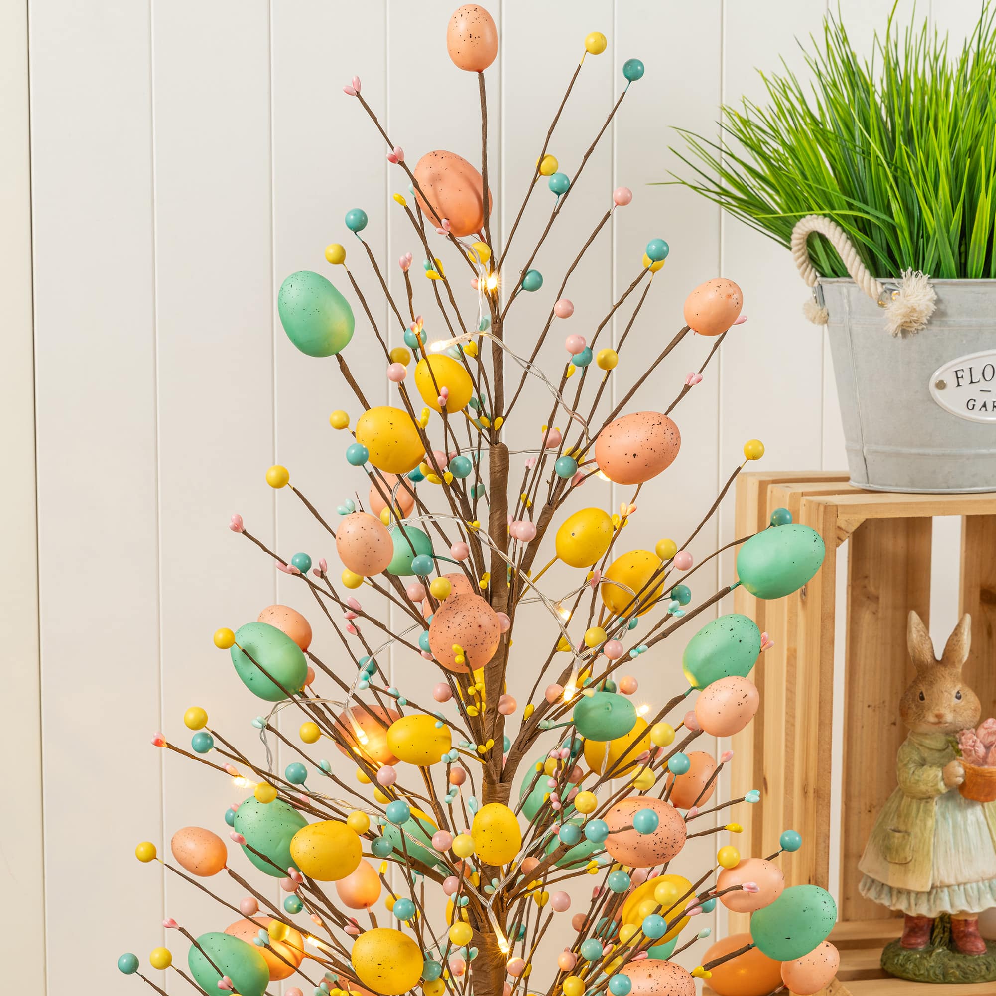 Glitzhome® 36" Lighted Easter Egg & Berries Urn Porch Tree with Timer