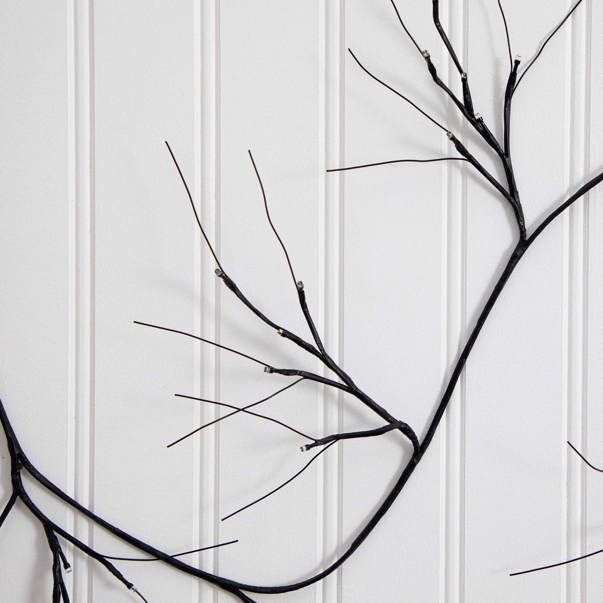 6.5ft. Pre-Lit Artificial Halloween Black Twig Garland with 48 Purple LED Lights