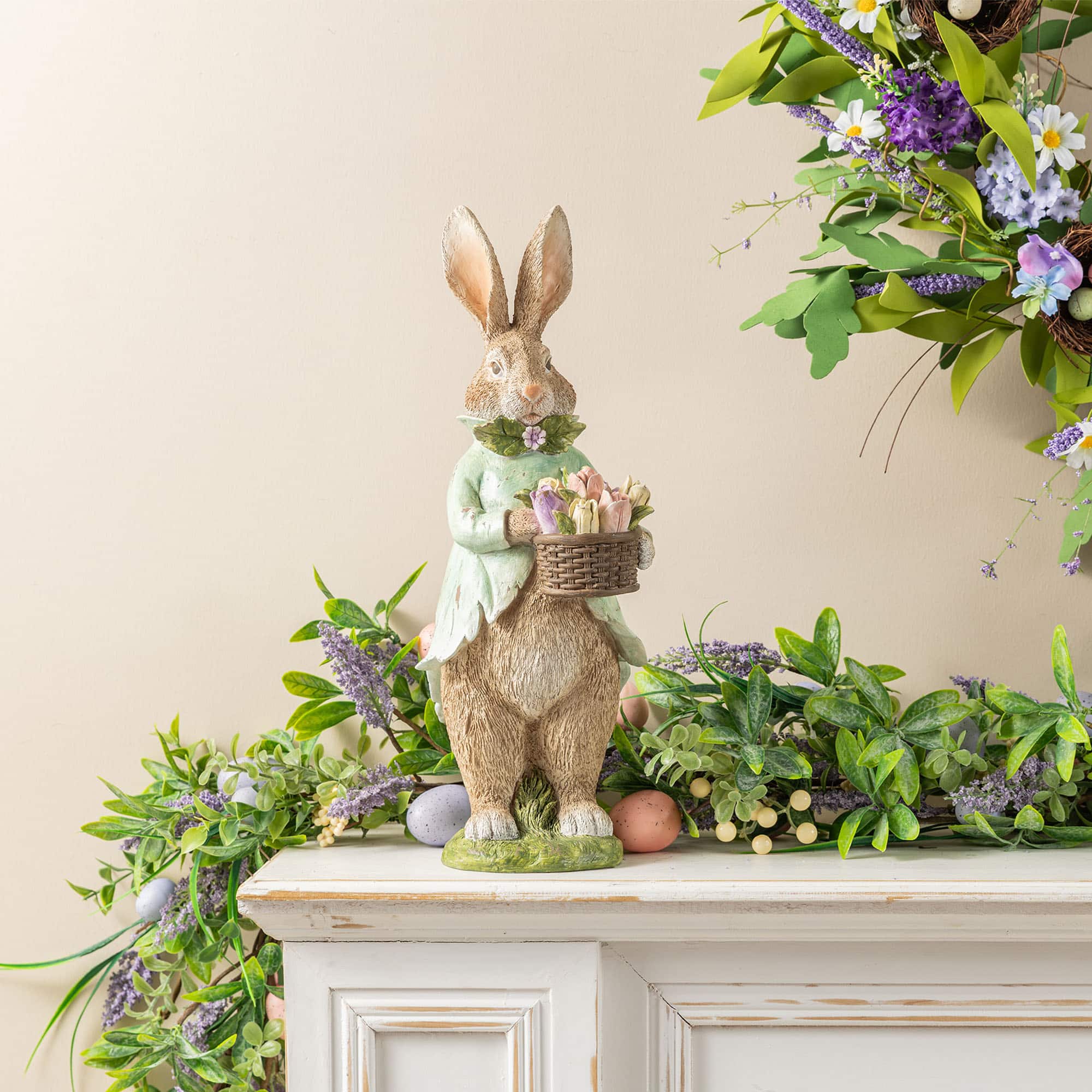 Glitzhome® 15.75" Easter Resin Bunny Boy with Flowers Table Decor