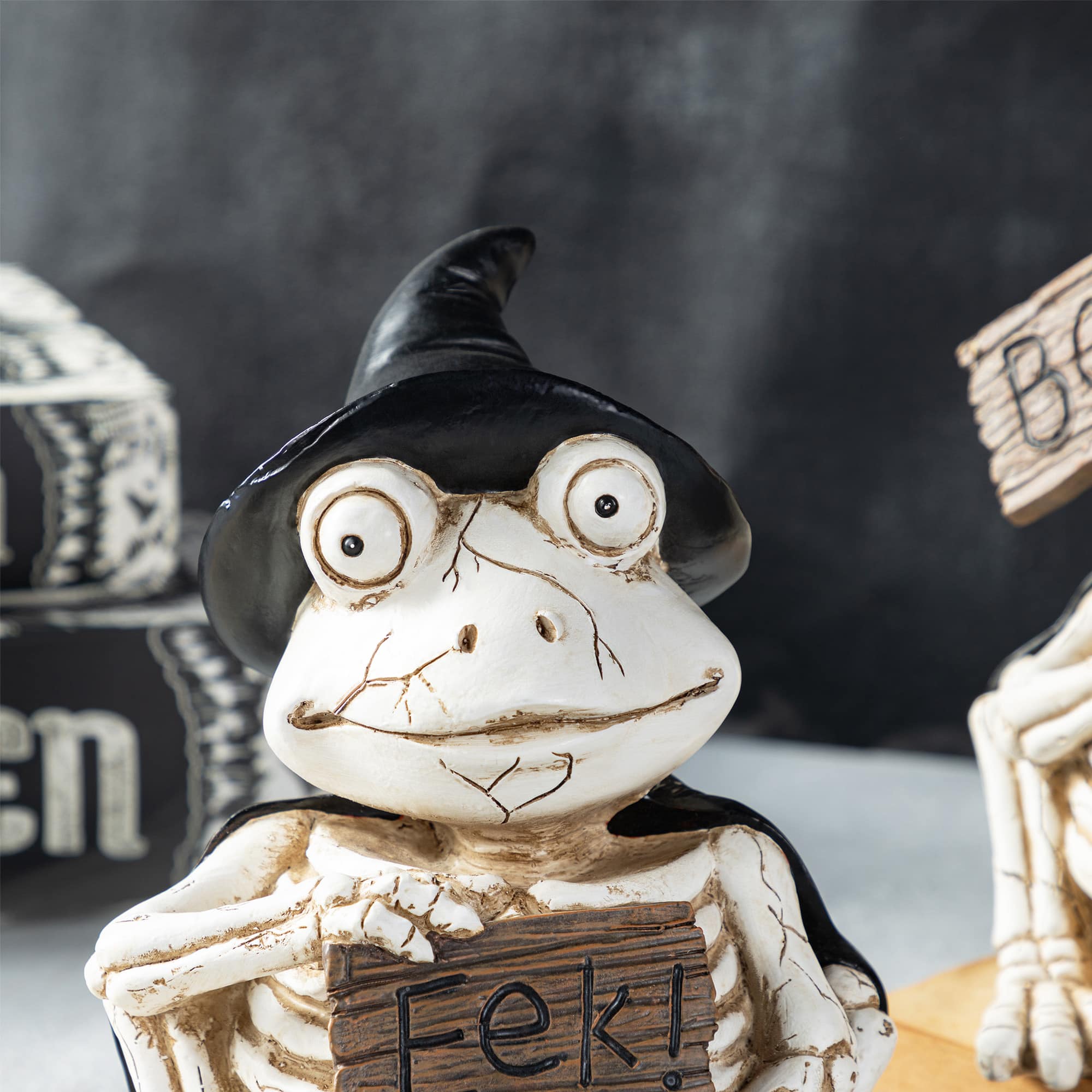 Glitzhome&#xAE; 7&#x22;H Halloween Resin Skeleton Frogs Table Decor Set