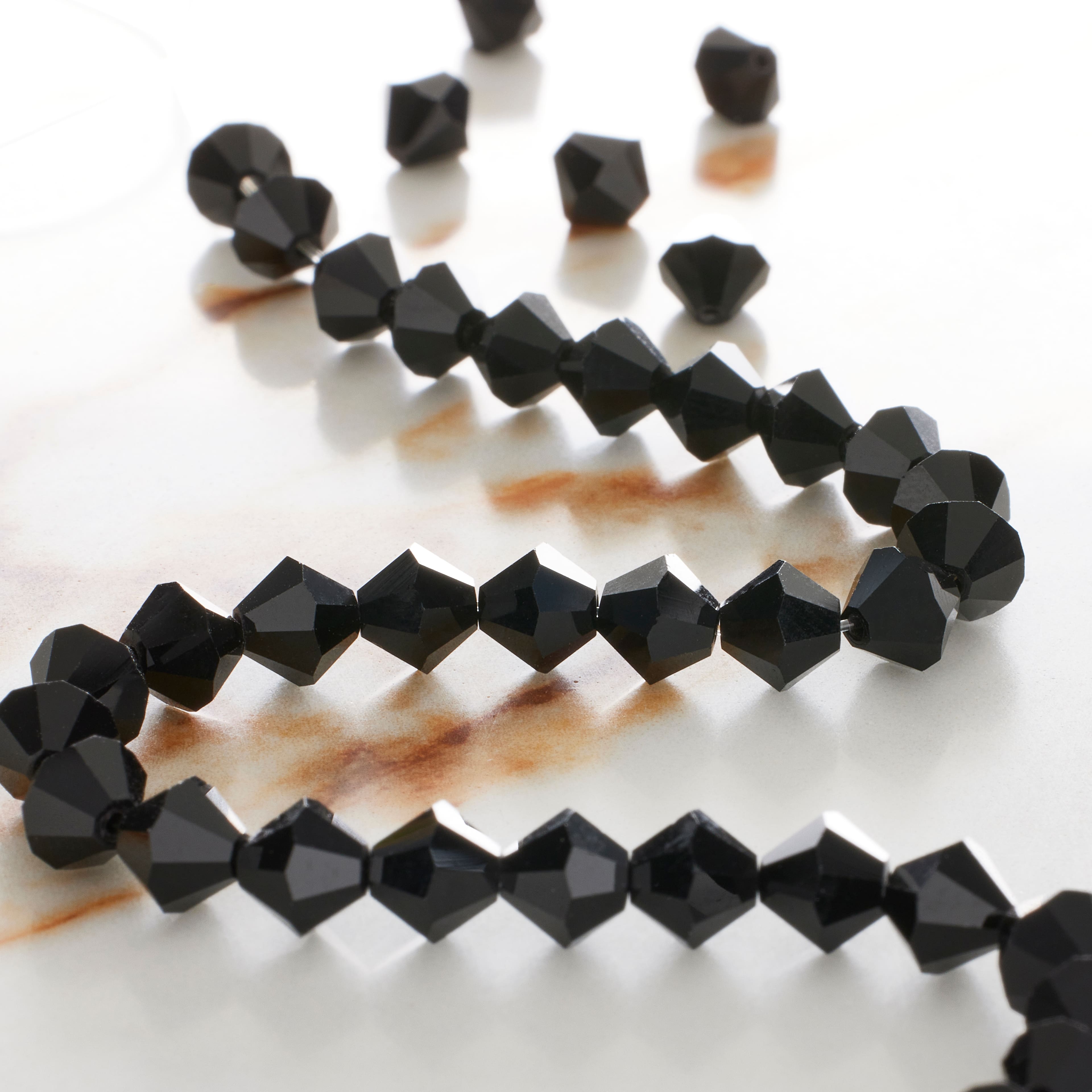 12 Pack: Preciosa Glass Crystal Bicone Beads, 6mm by Bead Landing™