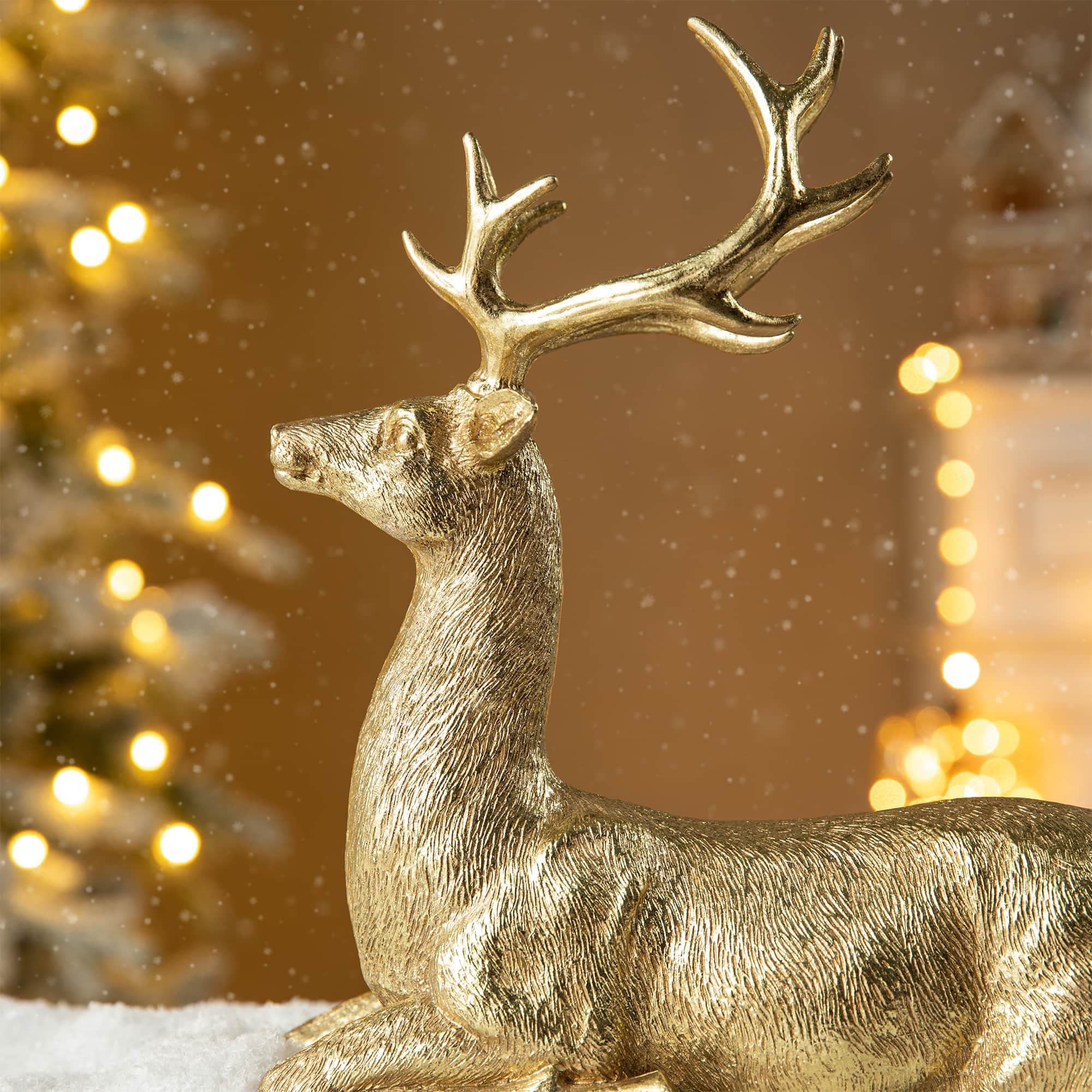 Glitzhome® 11" Lying Reindeer Table Décor