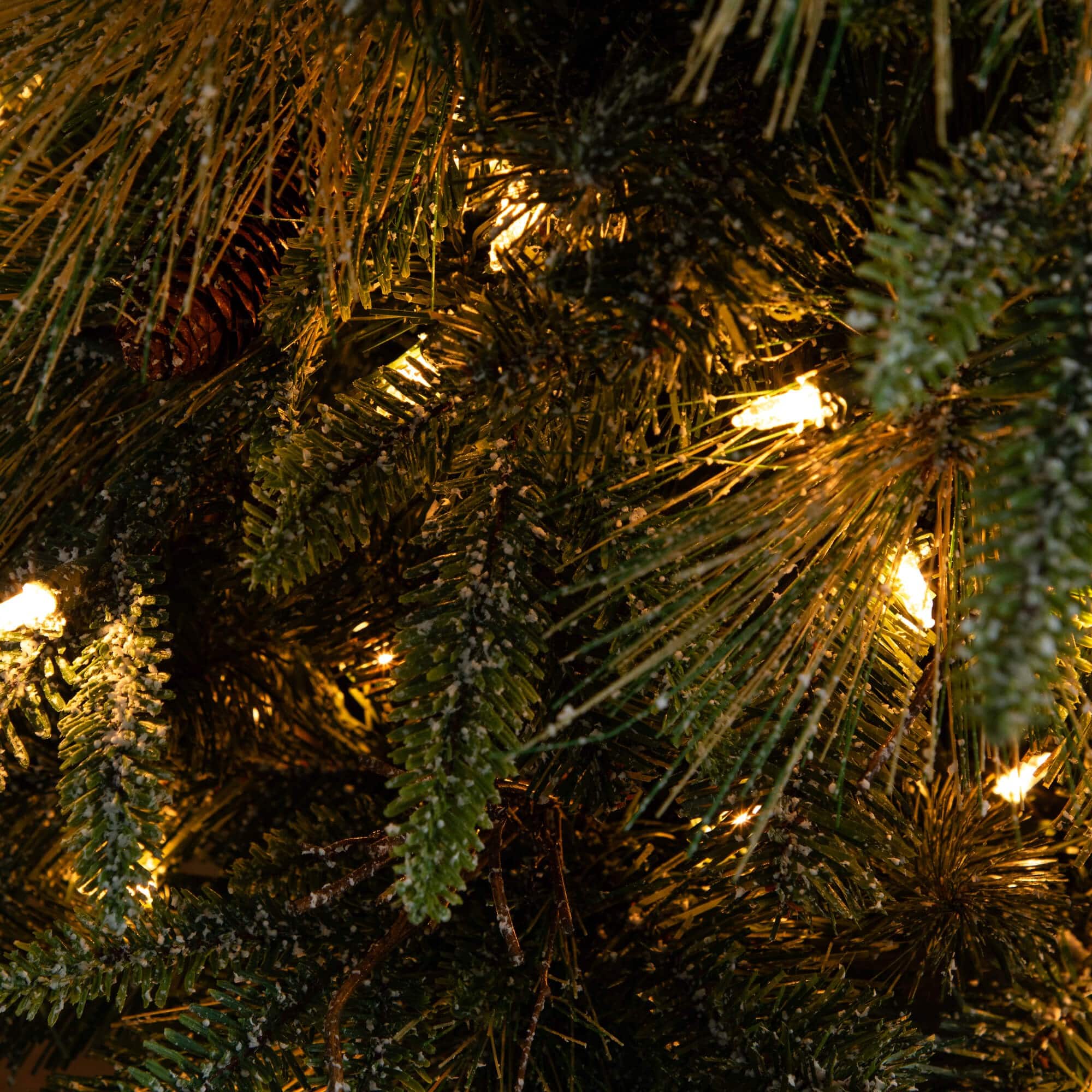 4ft. Pre-Lit Mixed Pine Snowed Artificial Christmas Tree with Pinecones in Decorative Planter, Warm White LED Lights