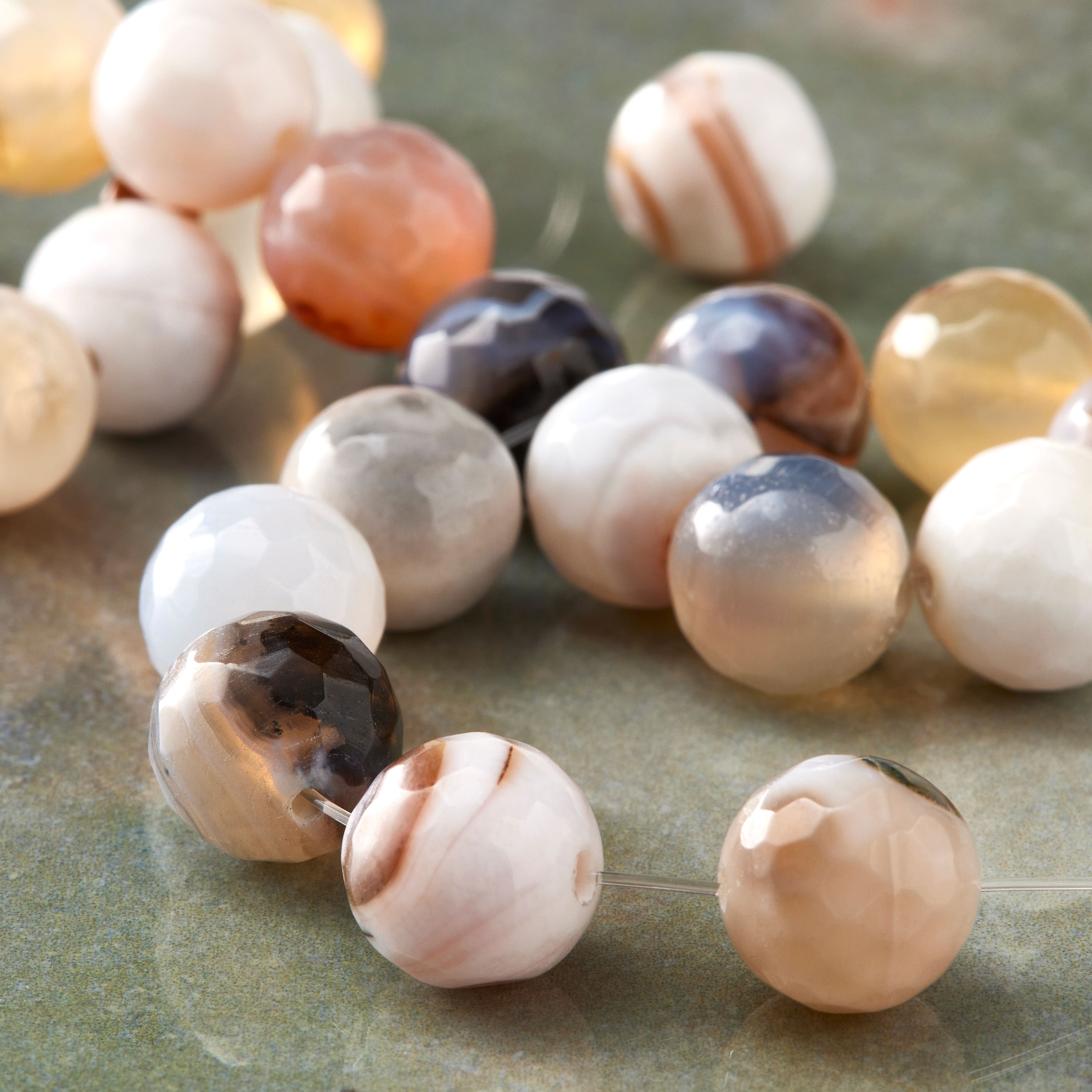 12 Pack: Fire Agate Faceted Round Beads, 10mm by Bead Landing™