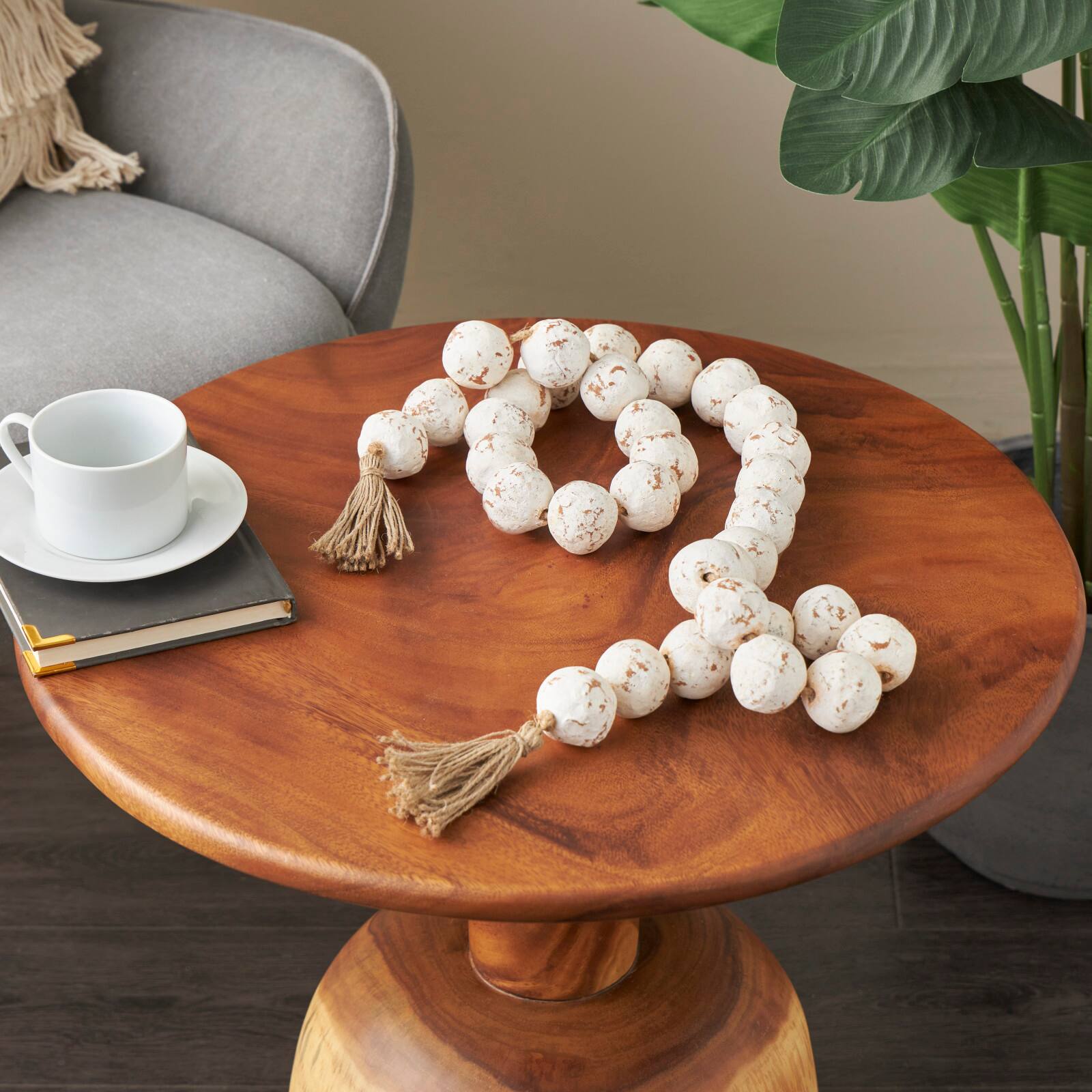 5ft. Paper Mache Round Distressed Beaded Garland with Tassel