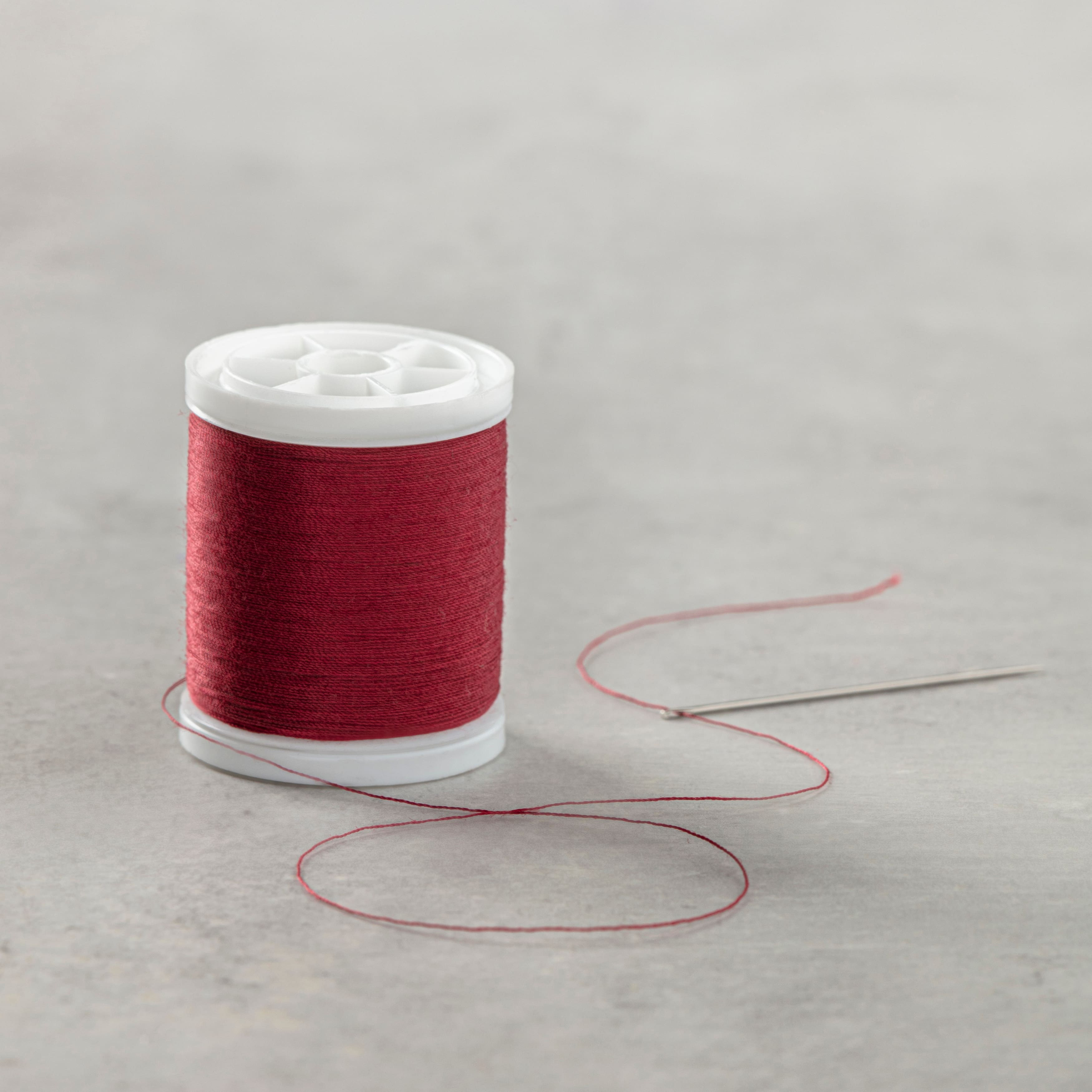 White Sewing Thread Roll 5-1/2 x 8OD, 1-2.5ID. 8/2PE