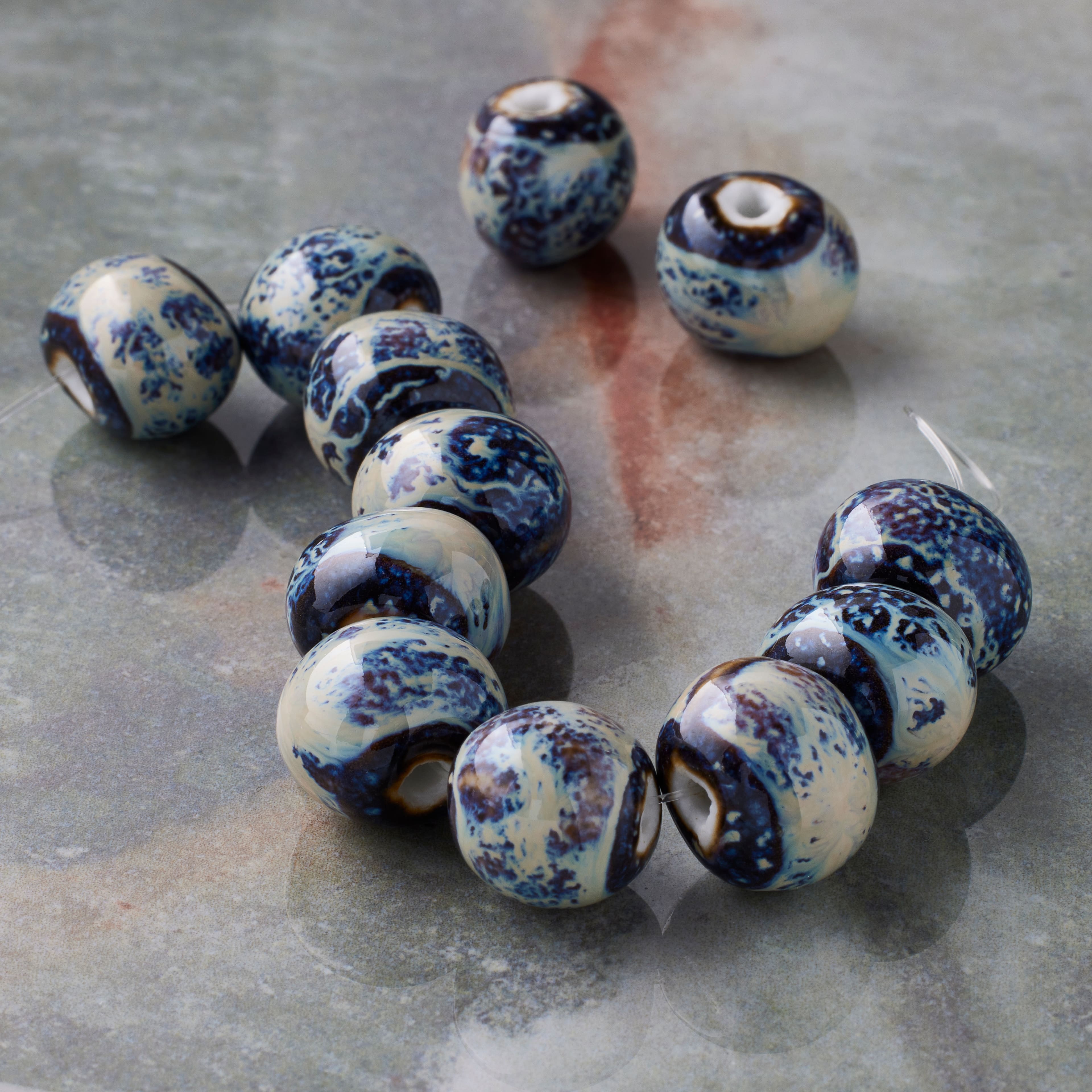12 Packs: 12 ct. (144 total) Blue Marbled Rondelle Ceramic Beads, 13.5mm by Bead Landing™