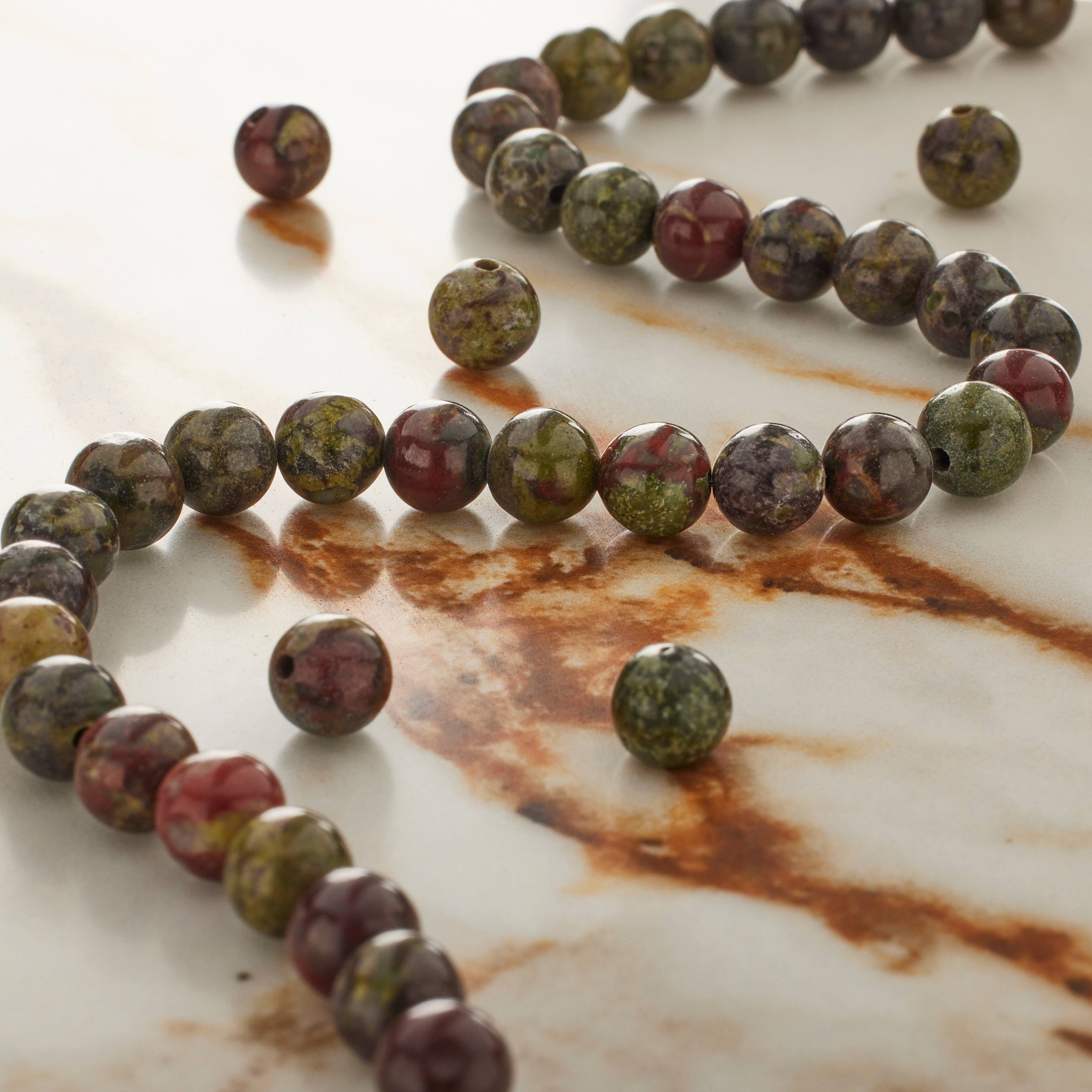 12 Pack: Dark Green &#x26; Red Dragon Blood Round Beads by Bead Landing&#x2122;