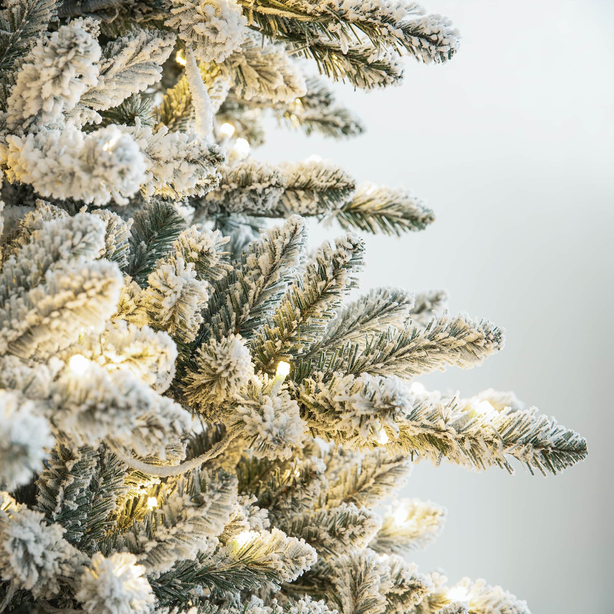 10ft. Pre-Lit Flocked Fir Artificial Christmas Tree, Warm White Lights