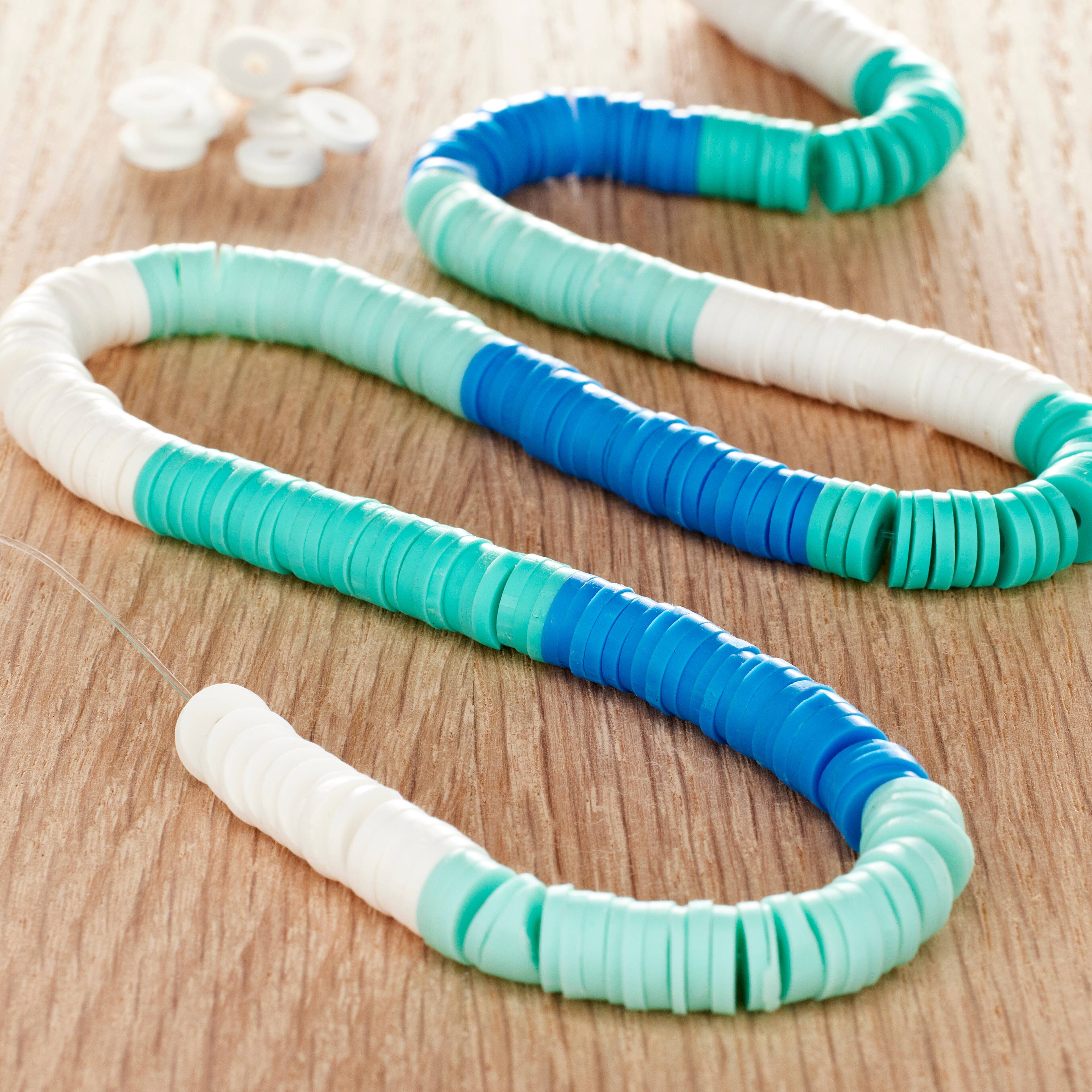 Espaceurs heishi en argile turquoise de Bead Landing, 6 mm